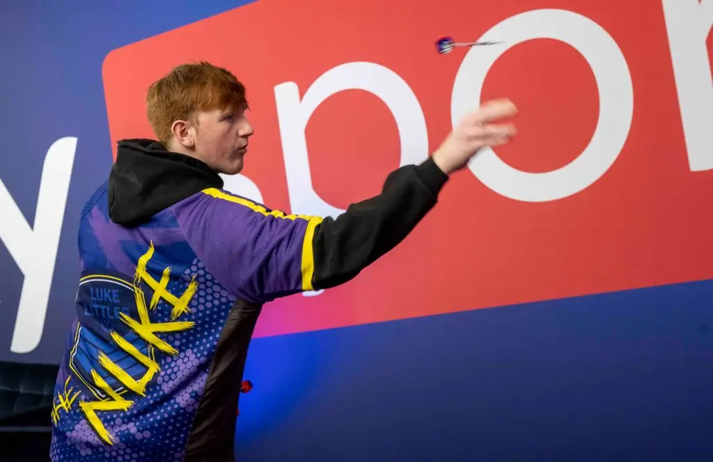 Ginge accompanied Littler to the World Championship final this year. (Image: Stuart C. Wilson/Getty Images for Sky Creative Brand)