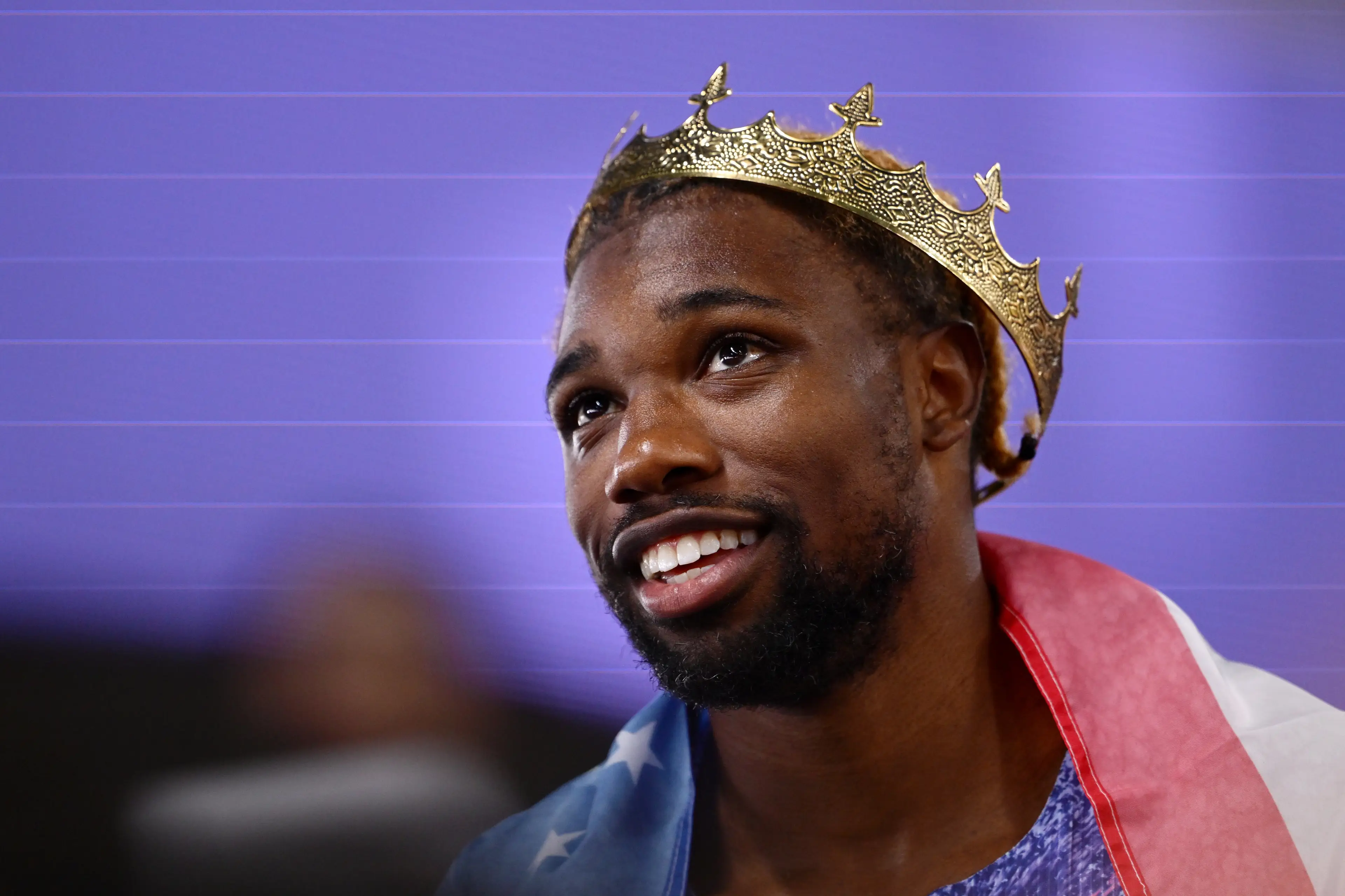 Noah Lyles celebrates relay victory. Image: Hannah Peters / Staff via Getty