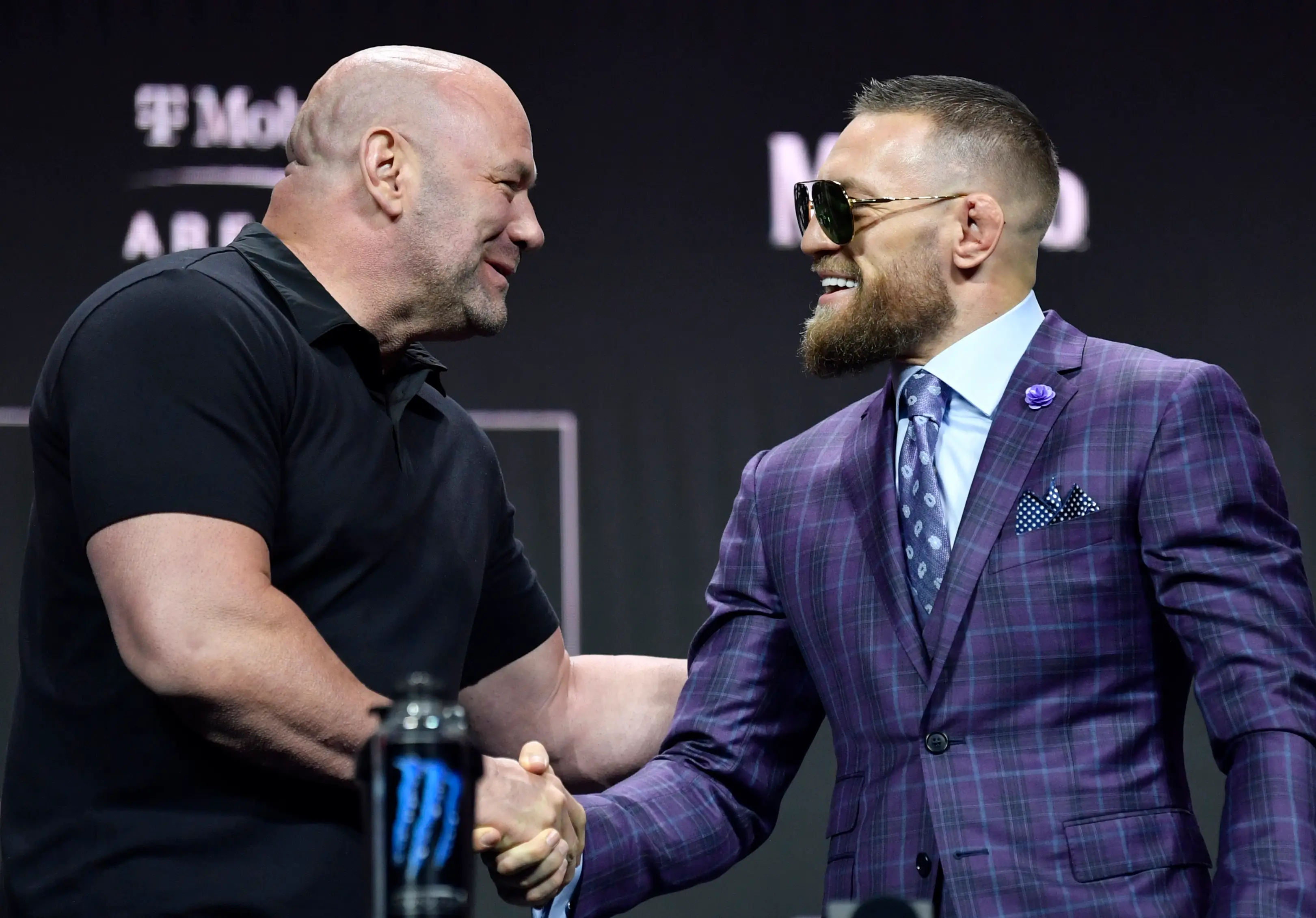 Dana White greets Conor McGregor at a UFC press conference. Image: Getty  