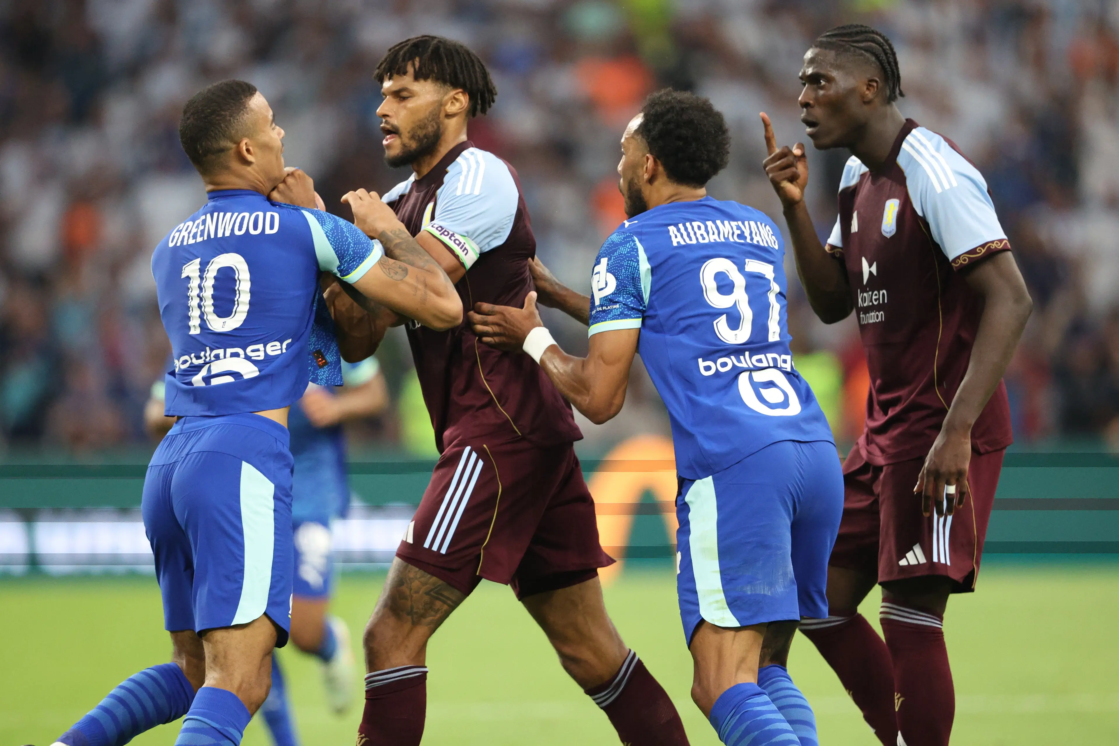 Mason Greenwood and Tyrone Mings. Image: Getty