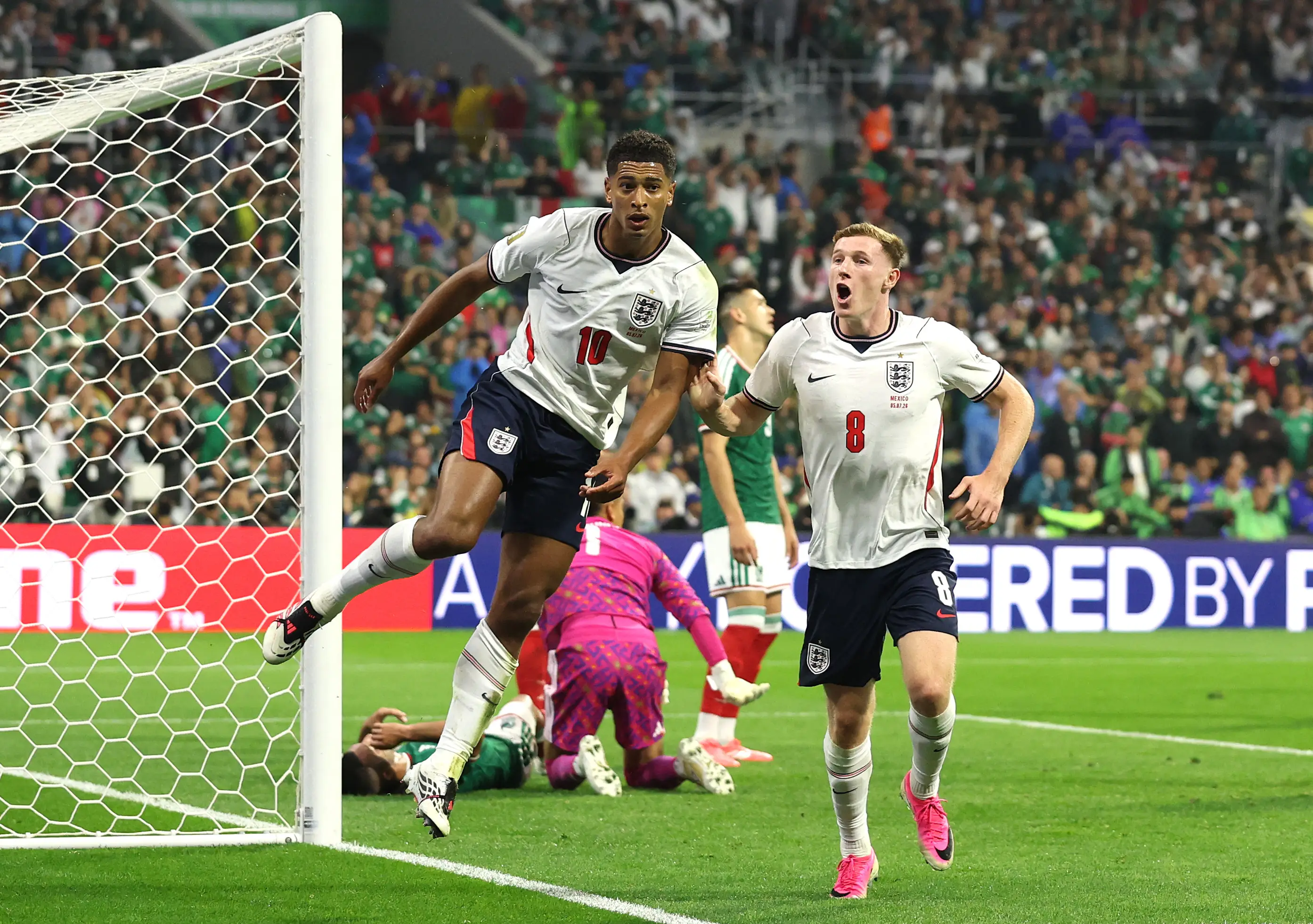 Jude Bellingham #10 of England celebrates with teammate Elliot Anderson #8 after scoring his team's second goal during the FIFA World Cup 2026 (Getty Images)