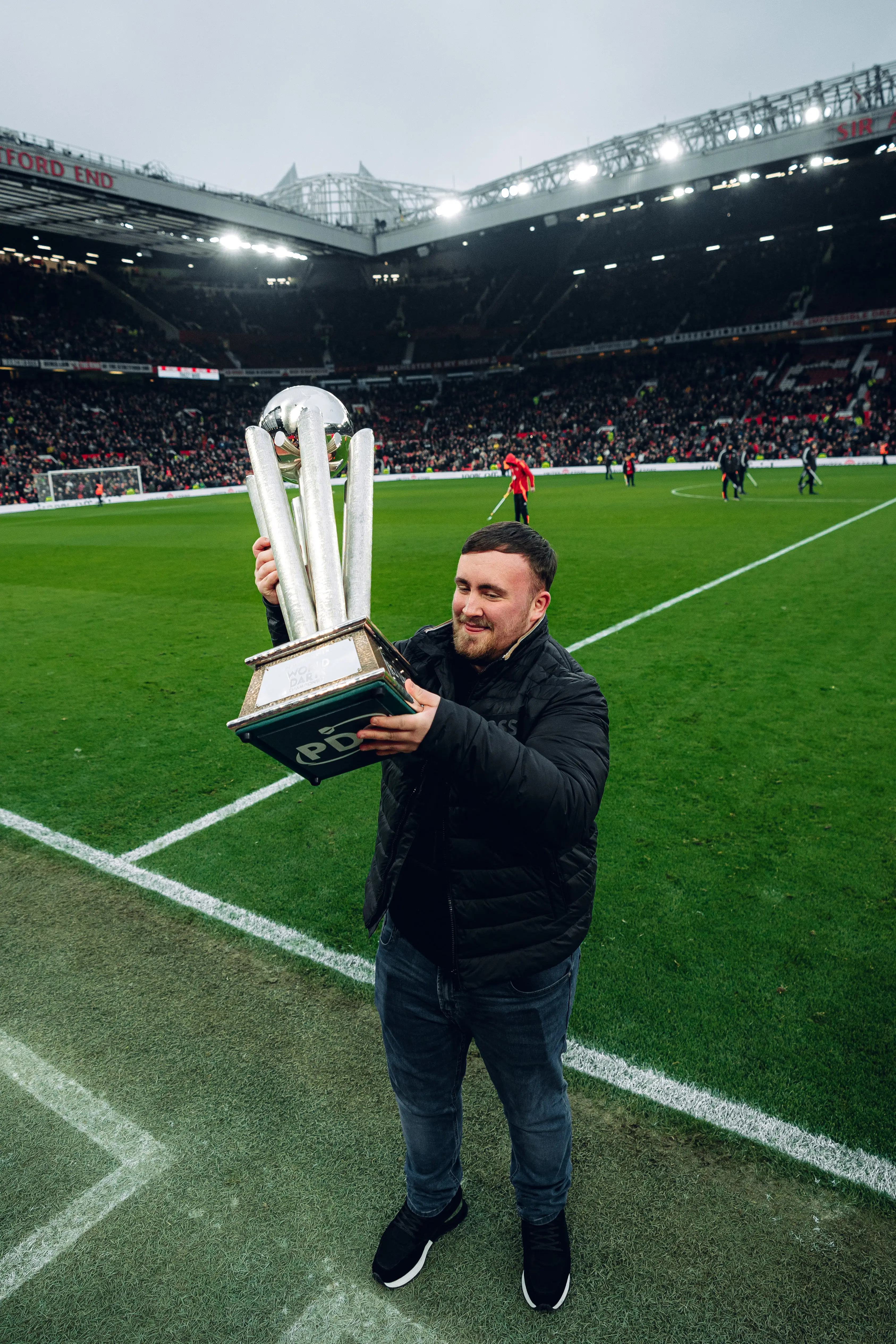 Luke Littler paraded his World Darts Championship trophy around Old Trafford. Image: Getty
