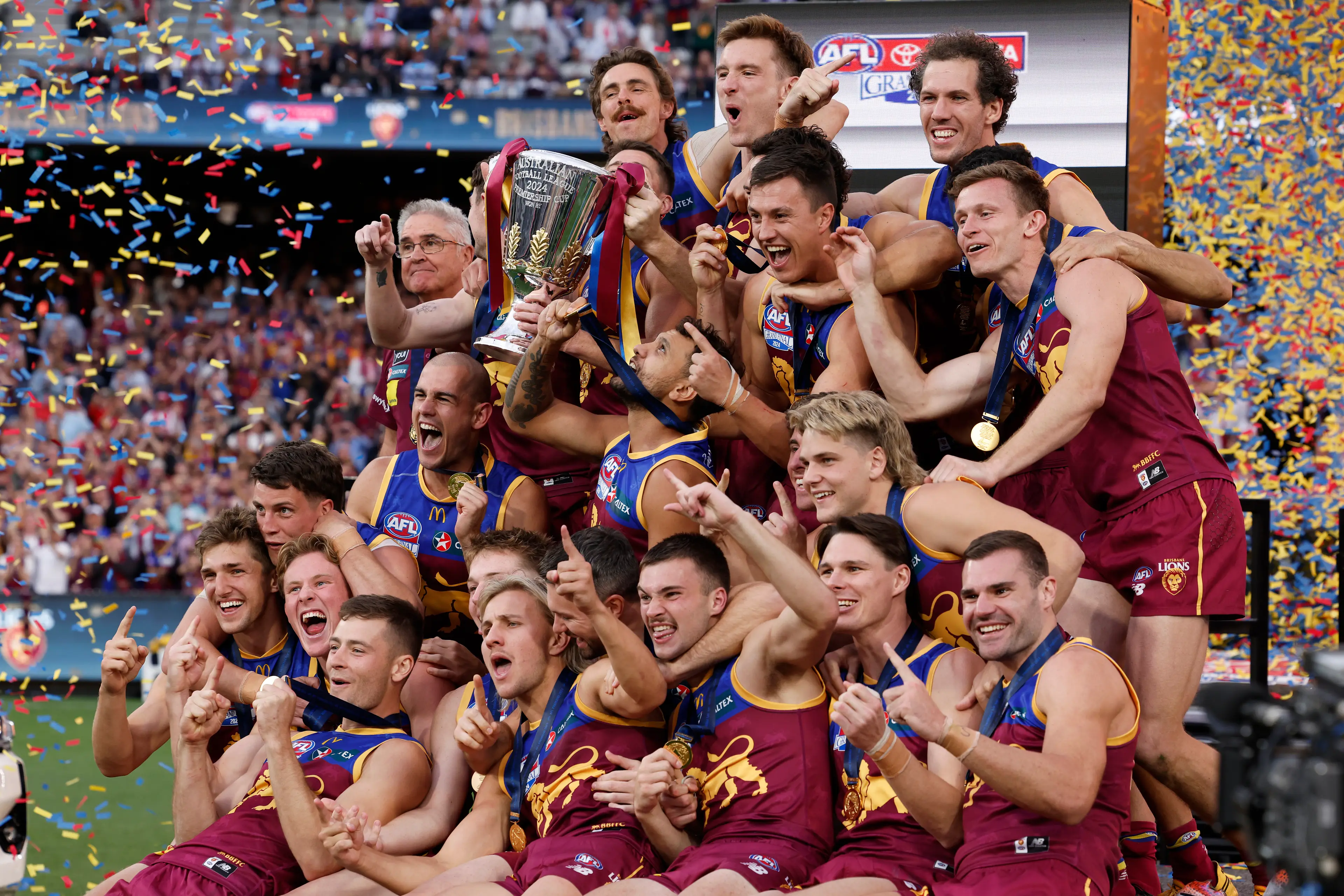 Brisbane celebrate their 2024 Grand Final win over Sydney / Photo by Daniel Pockett/AFL Photos/Getty Images