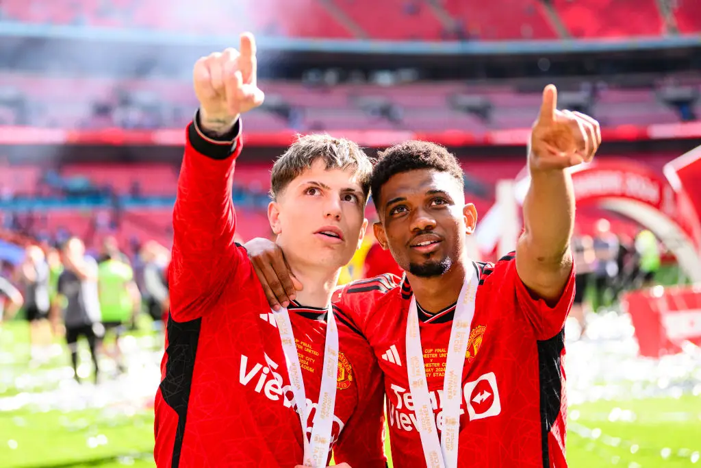 Alejandro Garnacho celebrates with Man Utd team-mate Amad Diallo after winning the 2024 FA Cup (