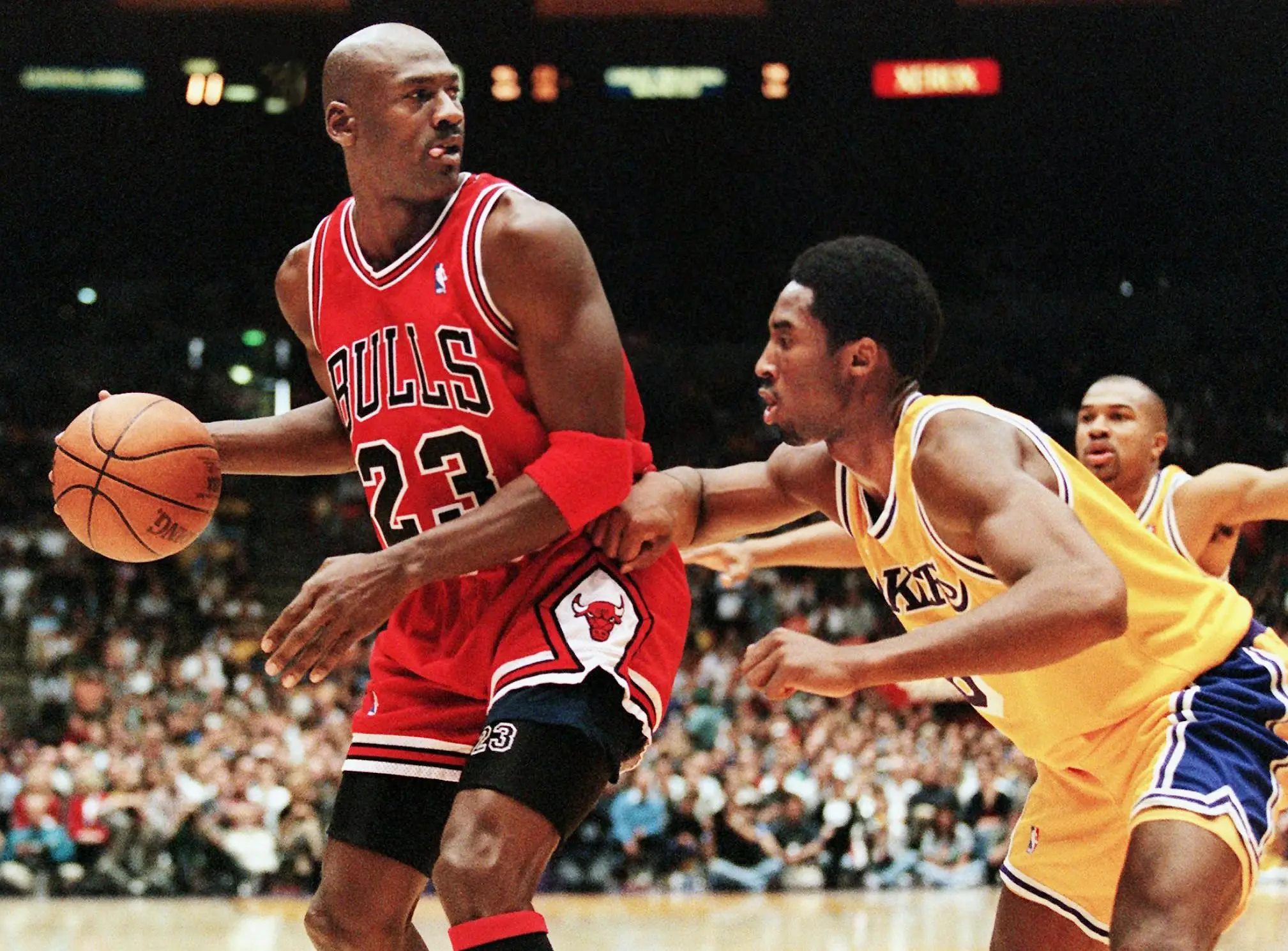 Michael Jordan playing against a young Kobe Bryant. Image: Getty