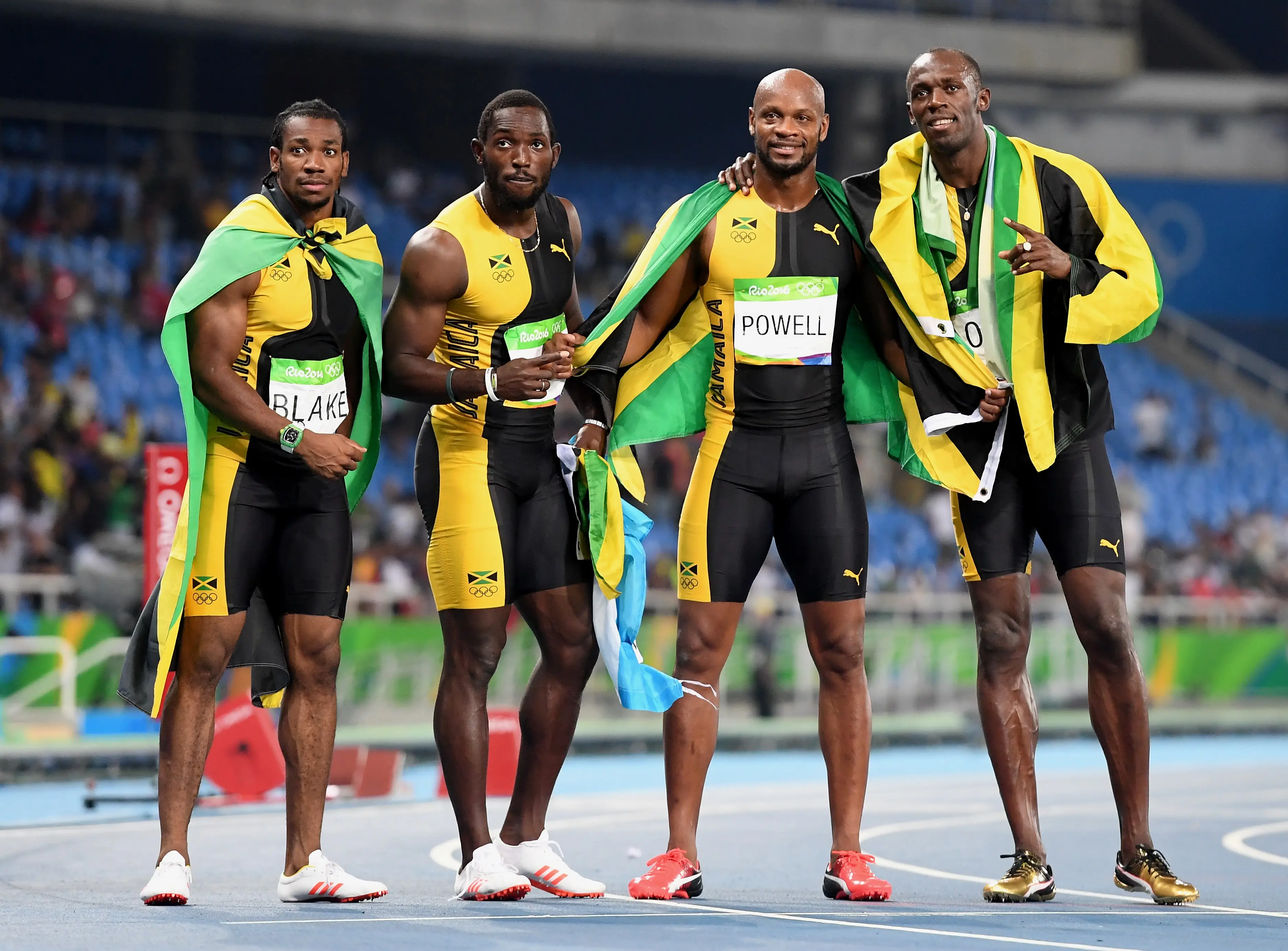 Usain Bolt with Asafa Powell and Yohan Blake. (Image: Getty)
