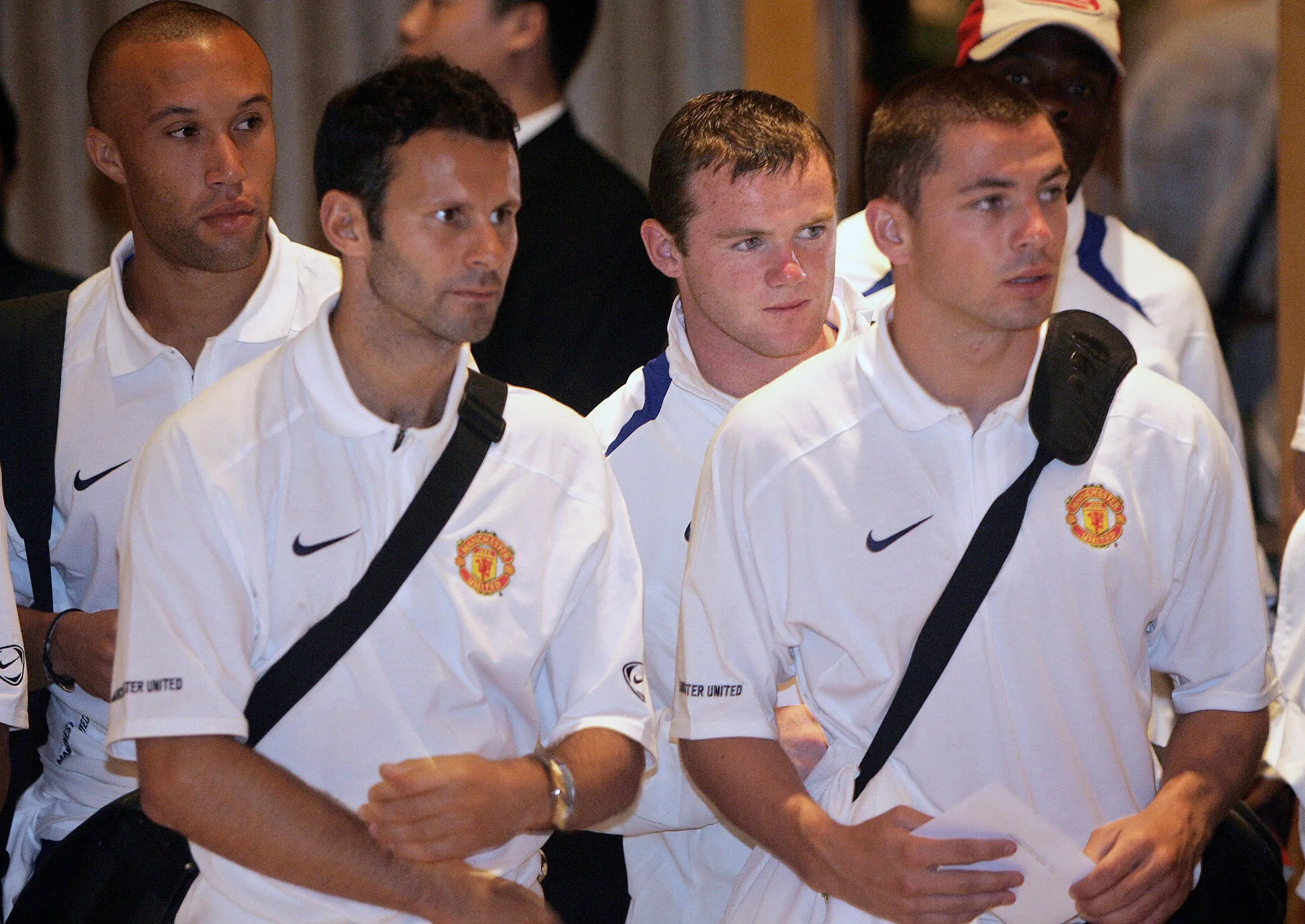 Ryan Giggs (left) and Wayne Rooney (back centre) pictured whilst at Man Utd (