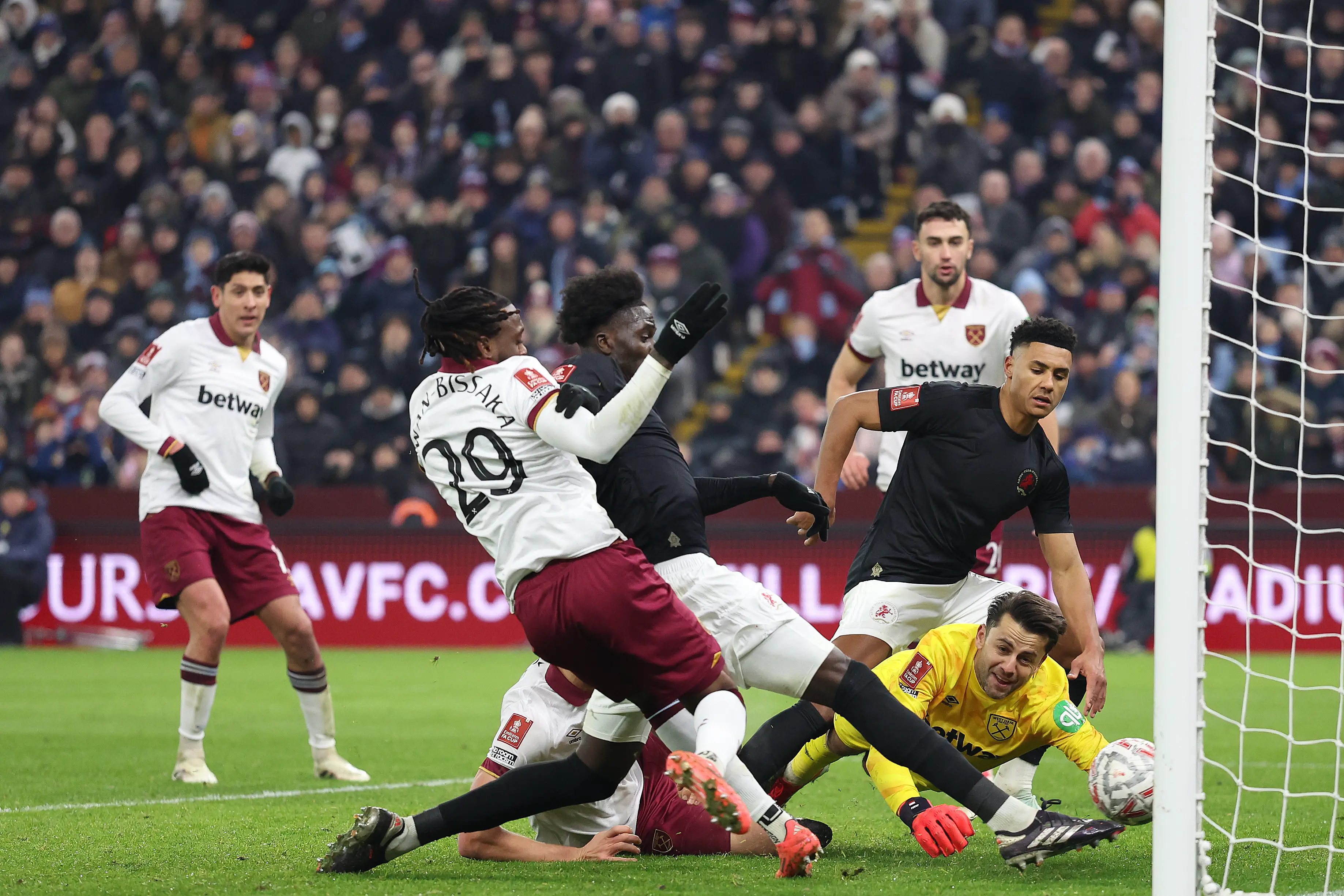 Amadou Onana pokes home to level proceedings. Image: Getty 