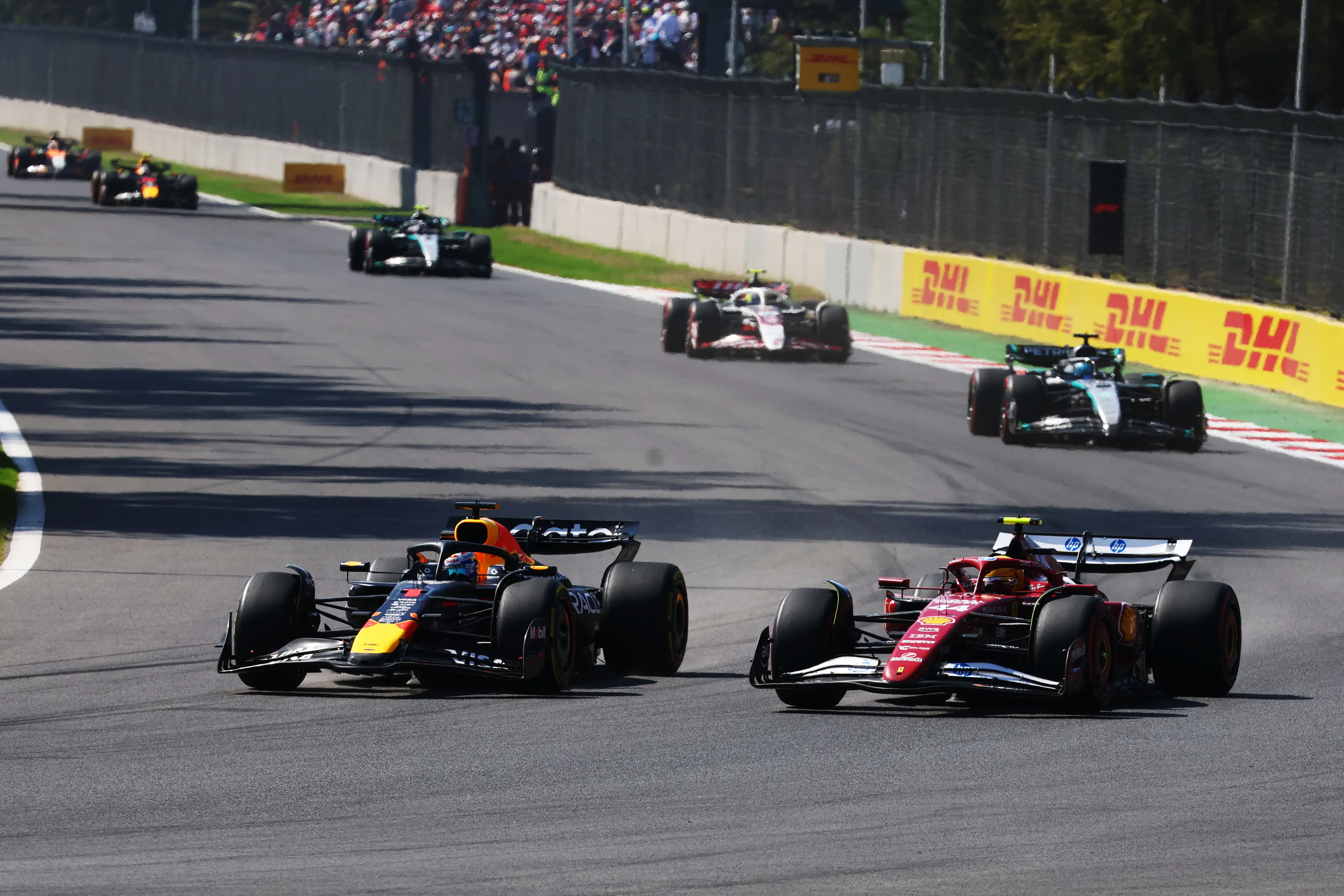 Lewis Hamilton racing Max Verstappen (Image: Getty)