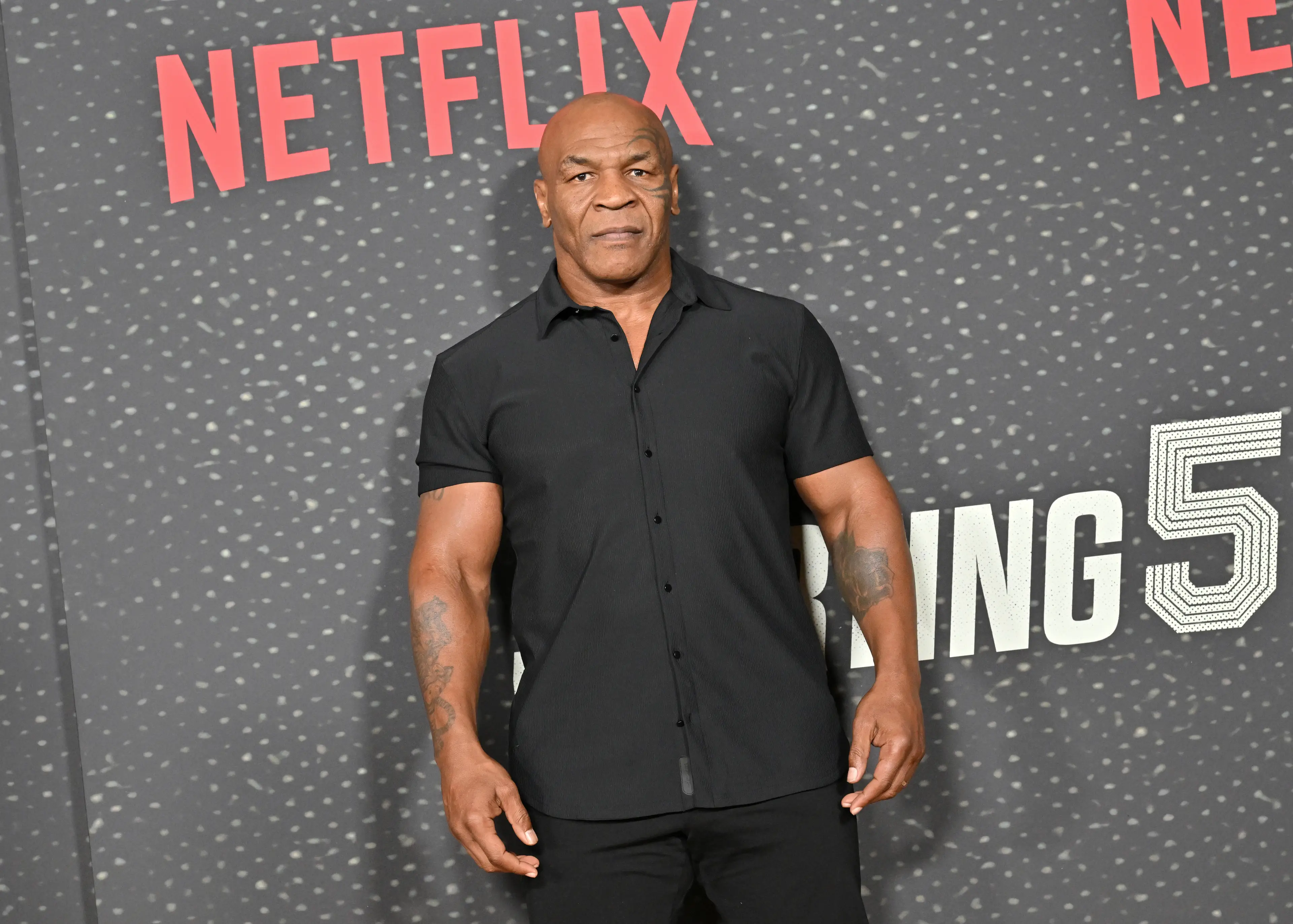 Mike Tyson attends a Netflix premiere ahead of his fight against Jake Paul. Image: Getty 