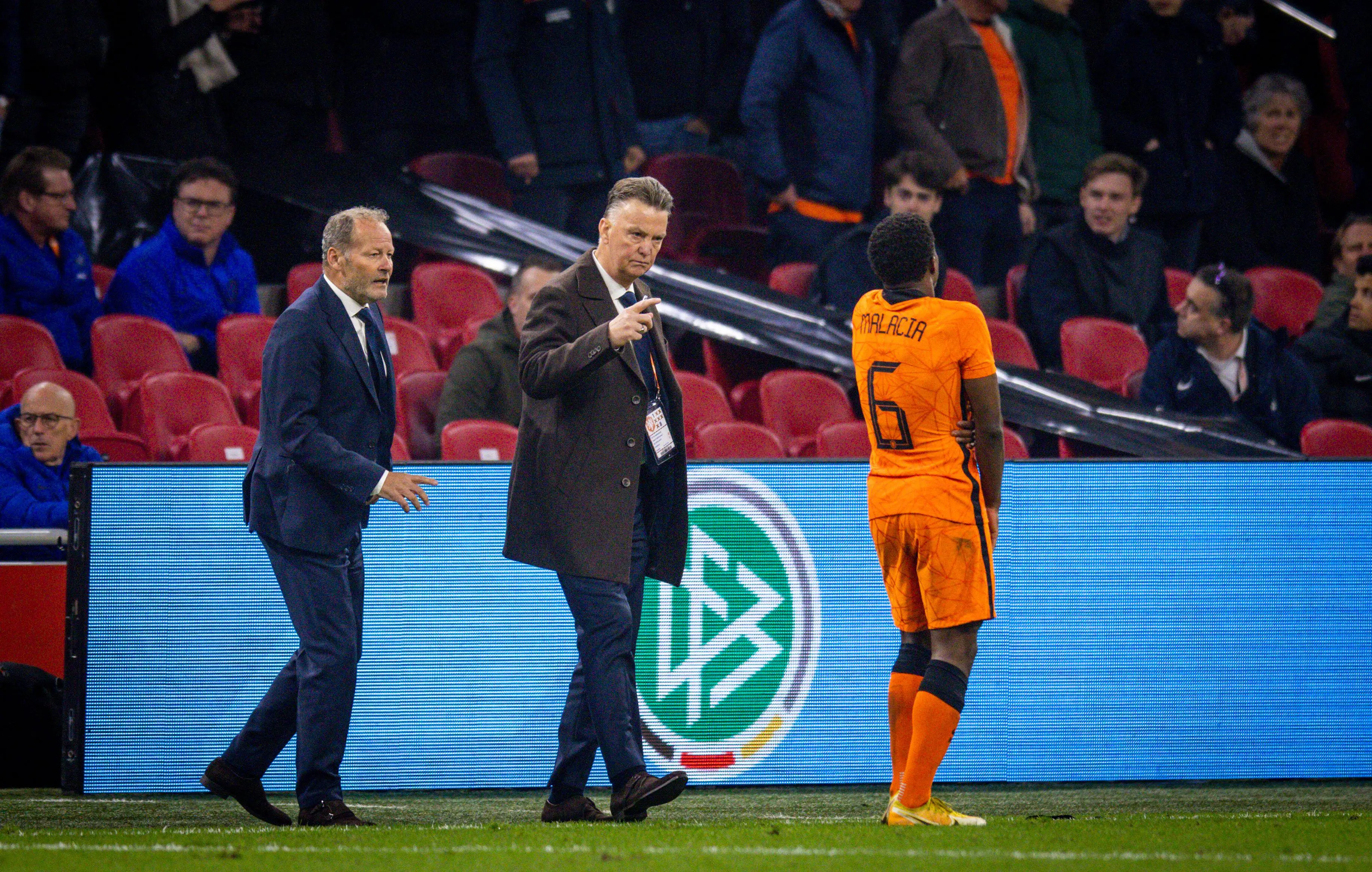 Tyrell Malacia taking instruction from former Manchester United manager Louis van Gaal. (Alamy)