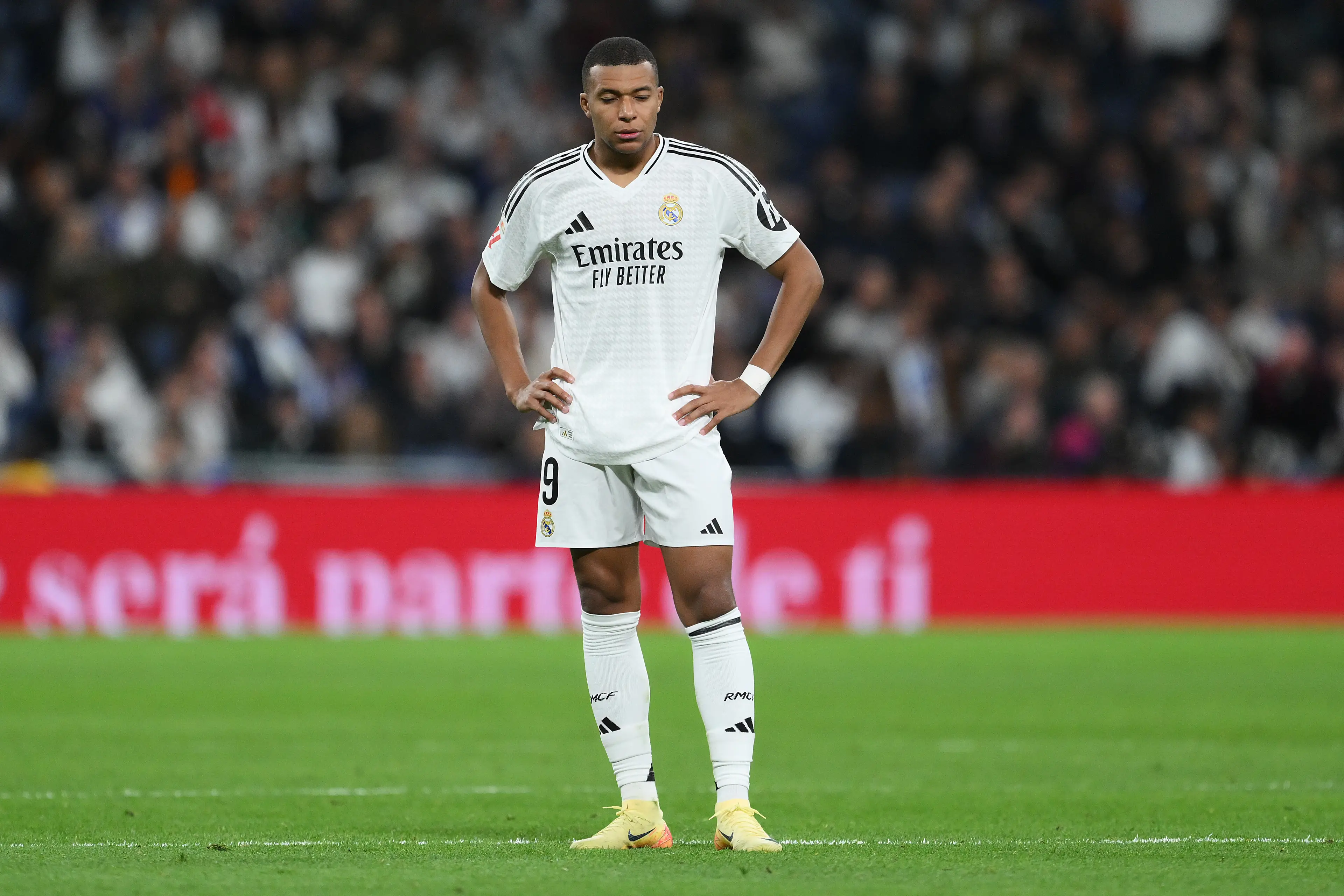 Kylian Mbappe cuts a dejected figure against Barcelona. Image: Getty