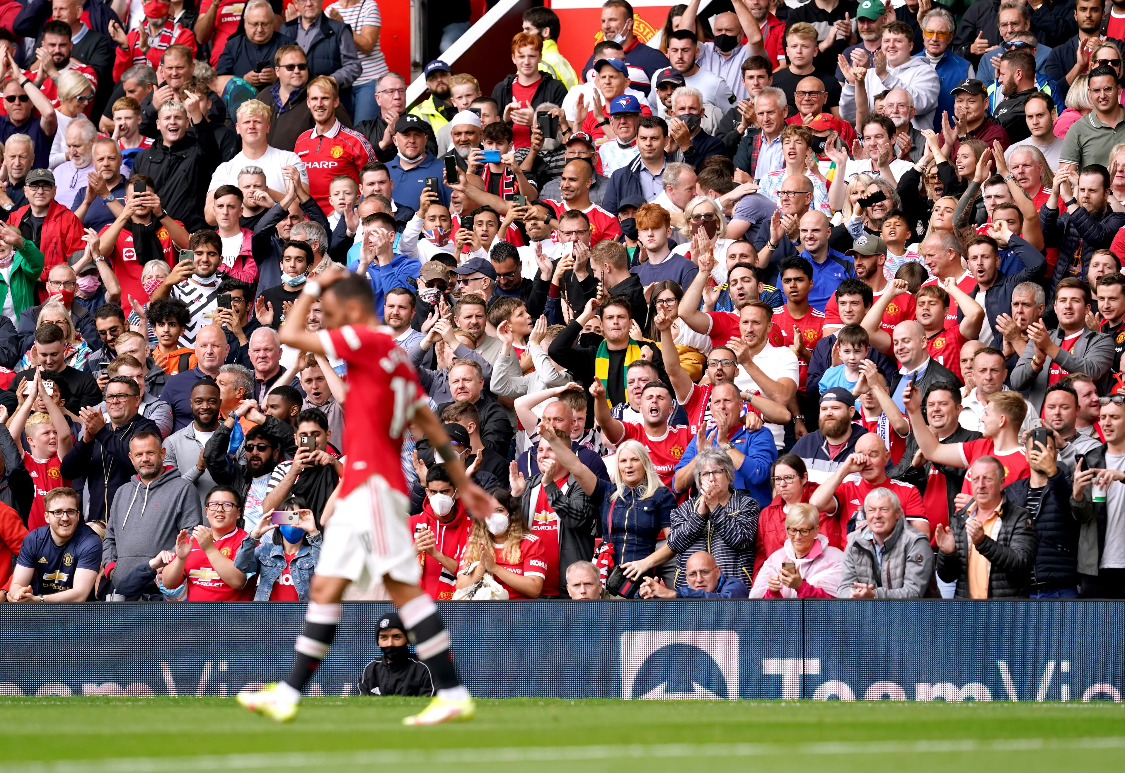 Manchester United fans have the biggest distance to the players when it comes to wages. Image: PA Images