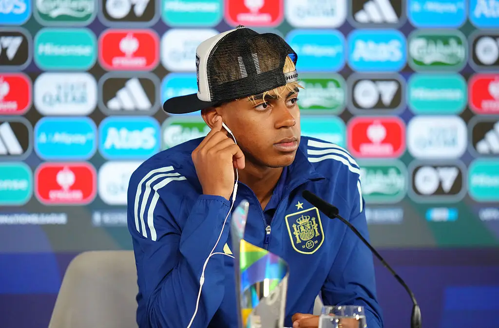 Lamine Yamal wore a cap during Spain's Nations League press conference after beating France. (Image: Getty)