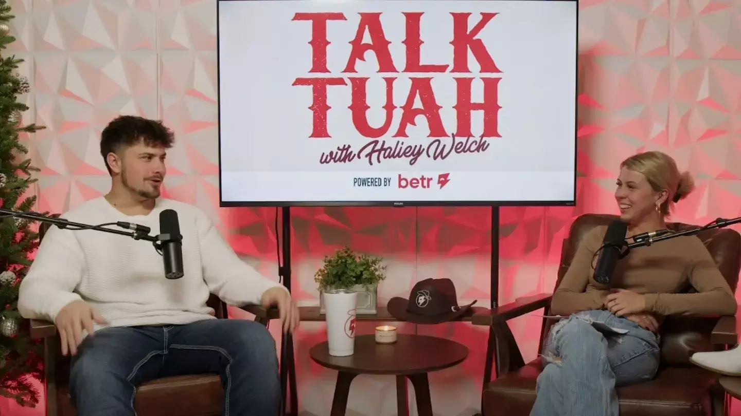Hailey Welch and her boyfriend speak on the latest episode of Talk Tuah. Image: YouTube/Talk Tuah