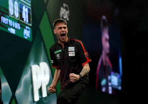 Taylor defeated Oskar Lukasiak 3-1 in the first round of the 2026 World Darts Championship (Image: Getty)