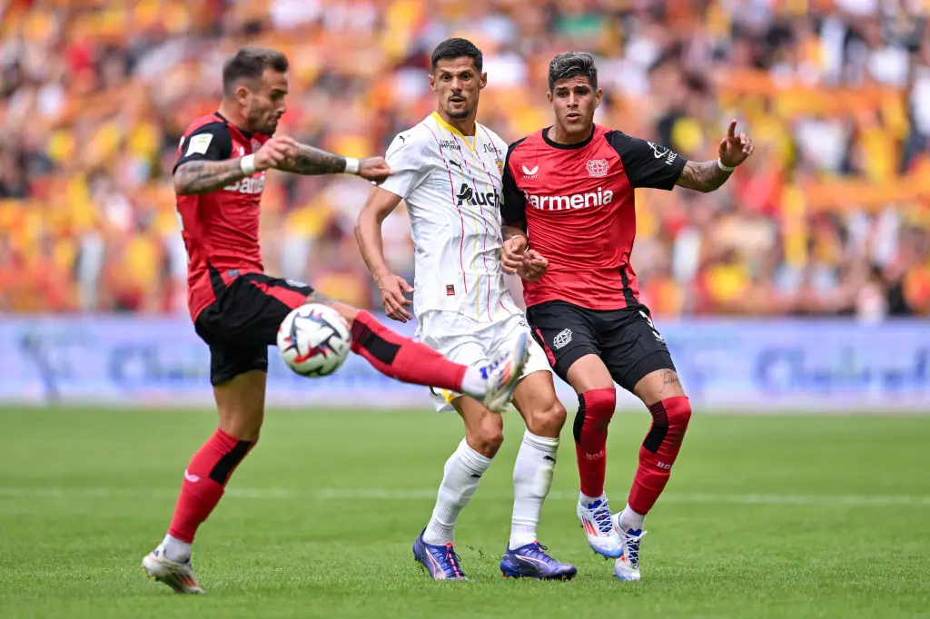 Piero Hincapie (right) in action for Bayer Leverkusen against RC Lens -