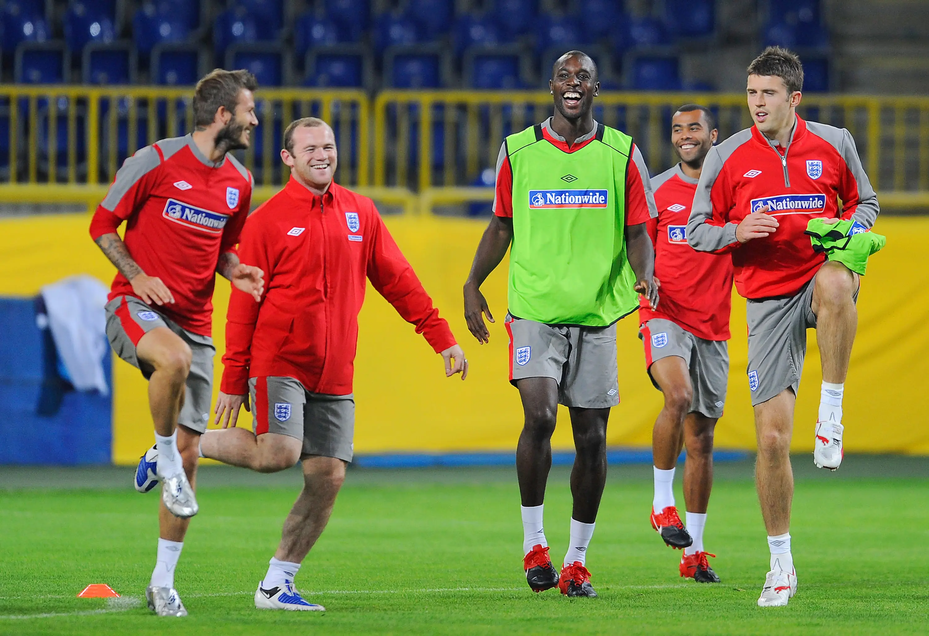 Carlton Cole and Wayne Rooney, among others, during an England training session. Image: Getty
