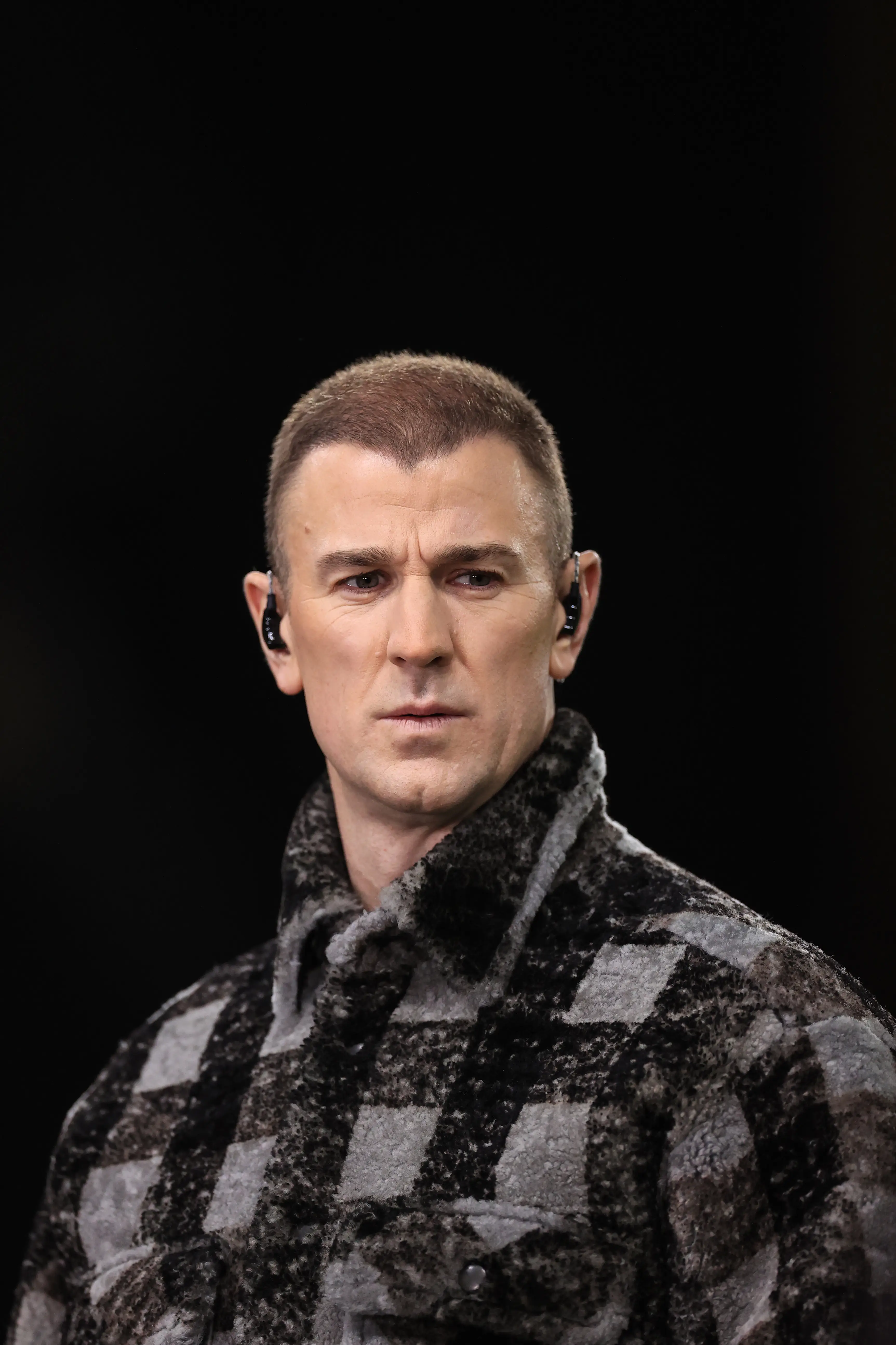 Hart's tattoos are visible when he is in short-sleeves and on punditry duty. Image: Getty