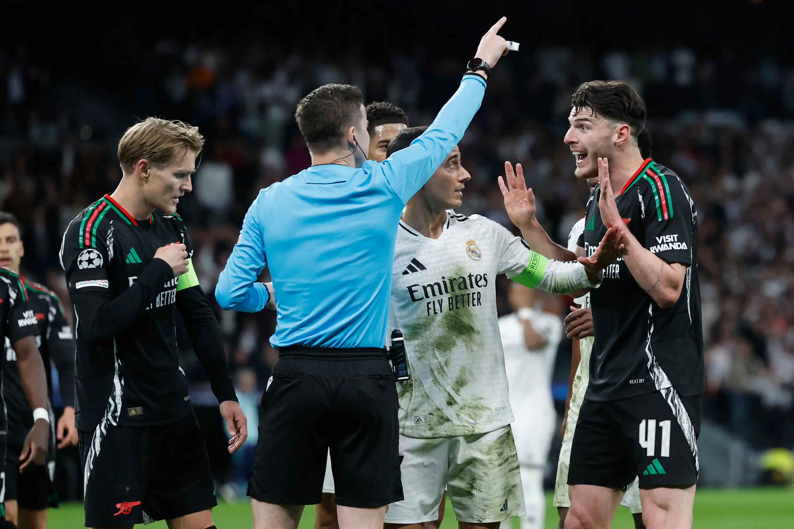 Declan Rice reacts after conceding a penalty before VAR overturned the referee's decision. Image: Getty 
