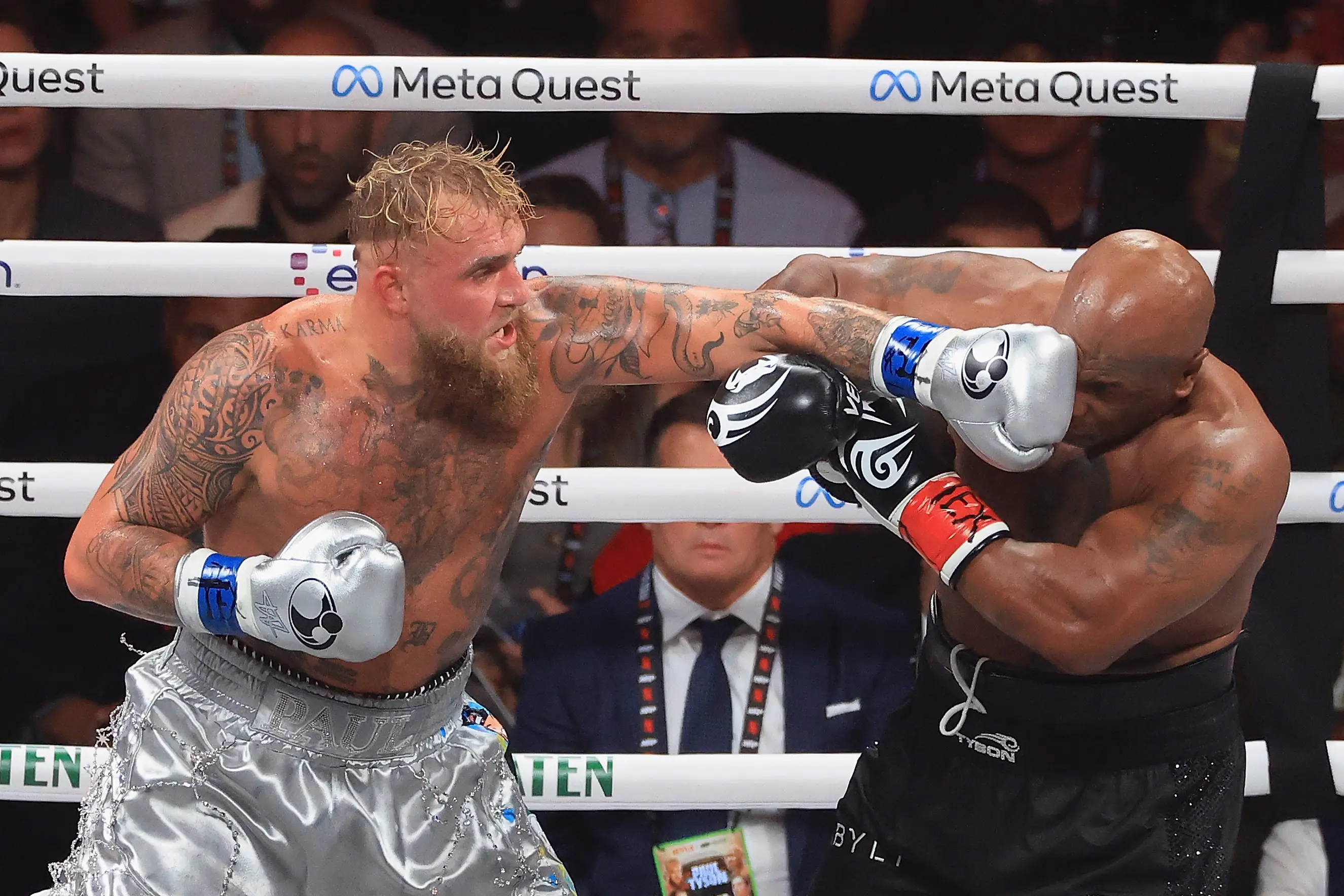 Jake Paul lands a punch on Mike Tyson during their fight. Image: Getty 