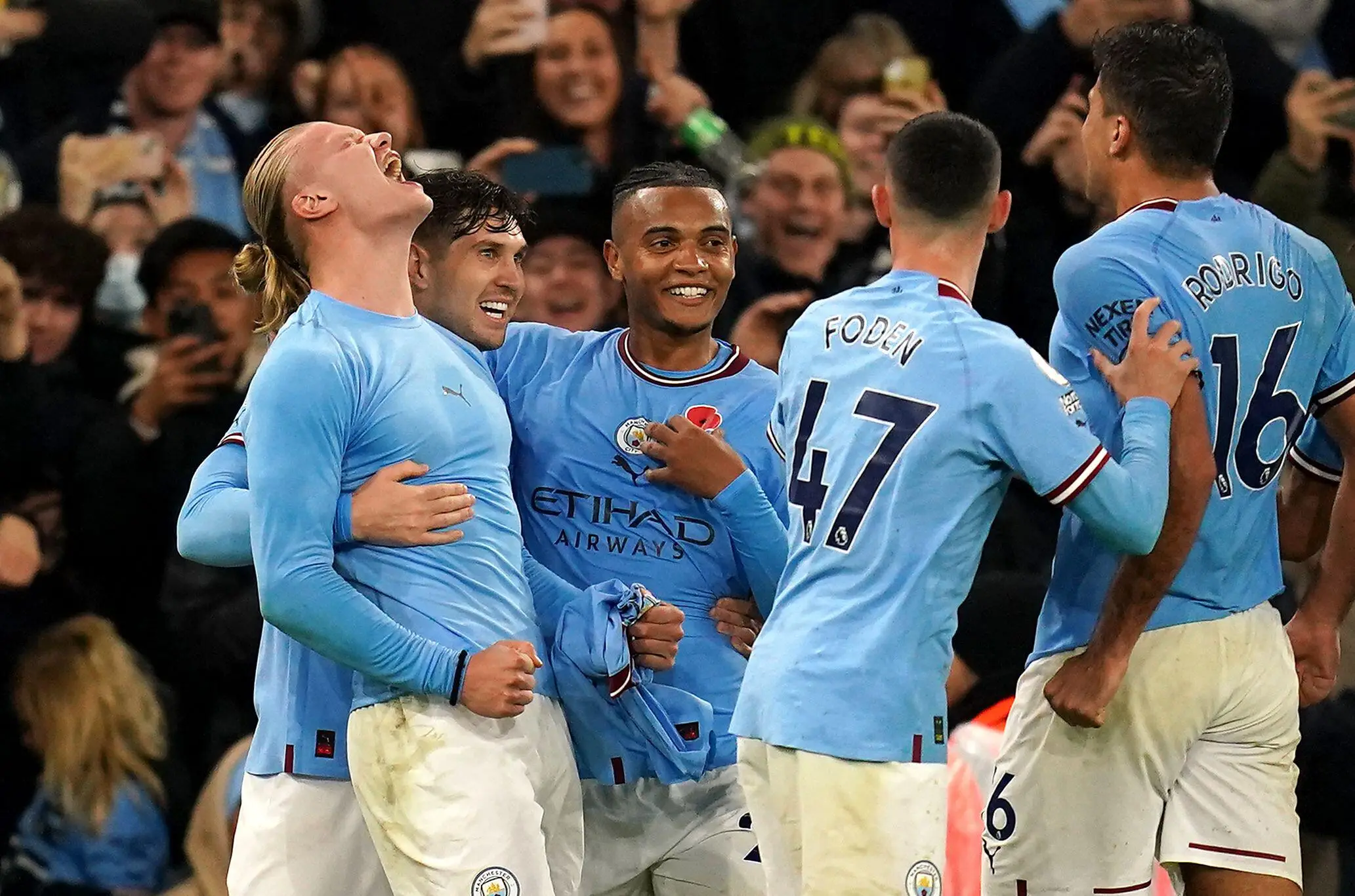 Haaland celebrates with his City teammates. (Image