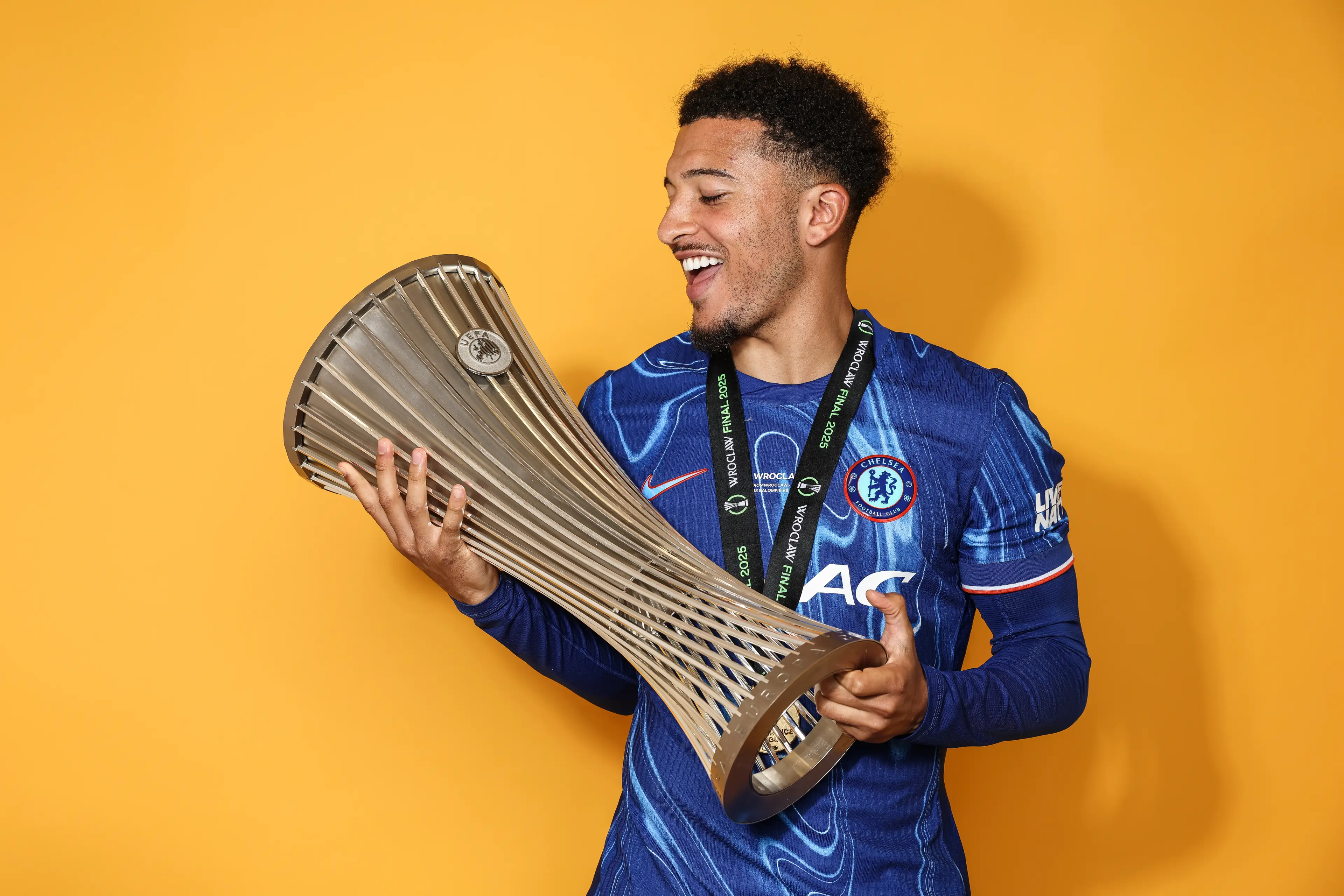 Jadon Sancho lifting the Conference League trophy (credit: getty)