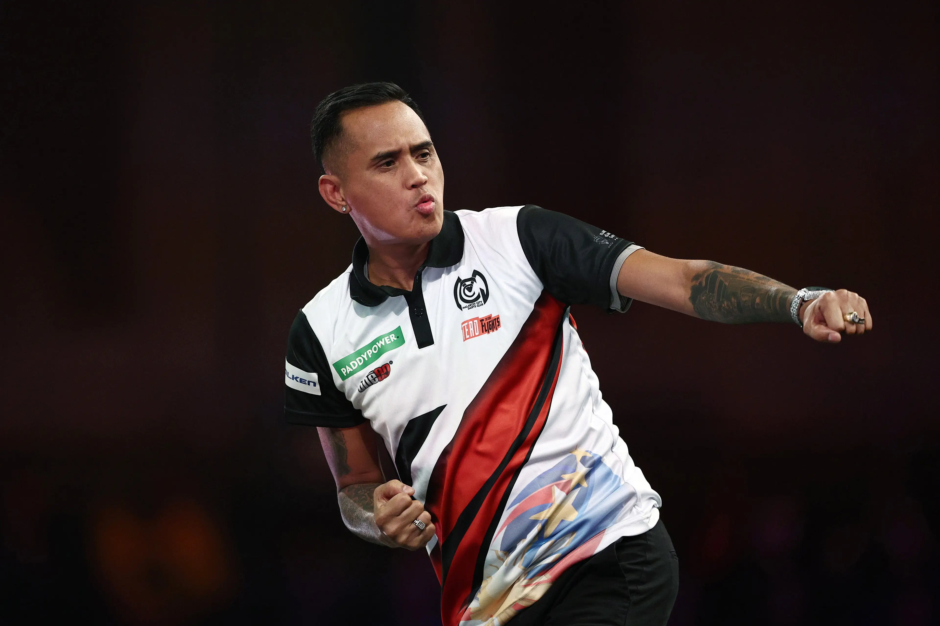 Lourence Ilagan will take on Littler at the Bahrain Masters. Image credit: Getty