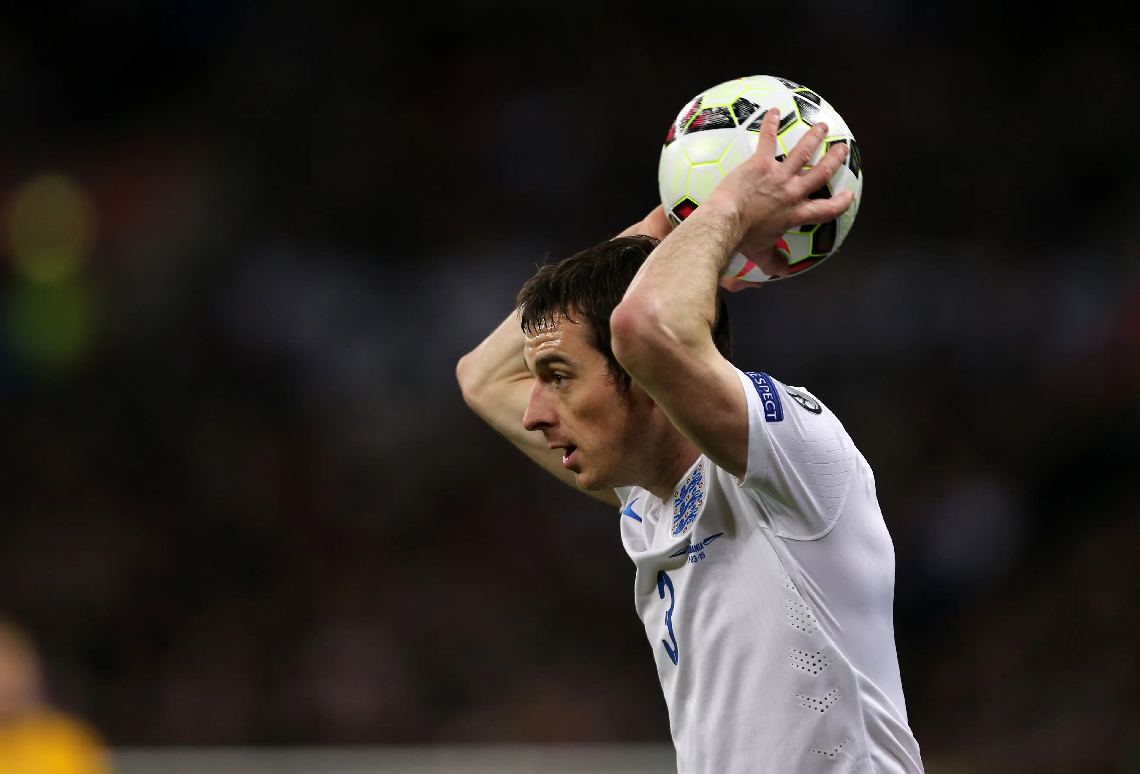 Leighton Baines takes a throw-in against Lithuania. Image credit: Getty