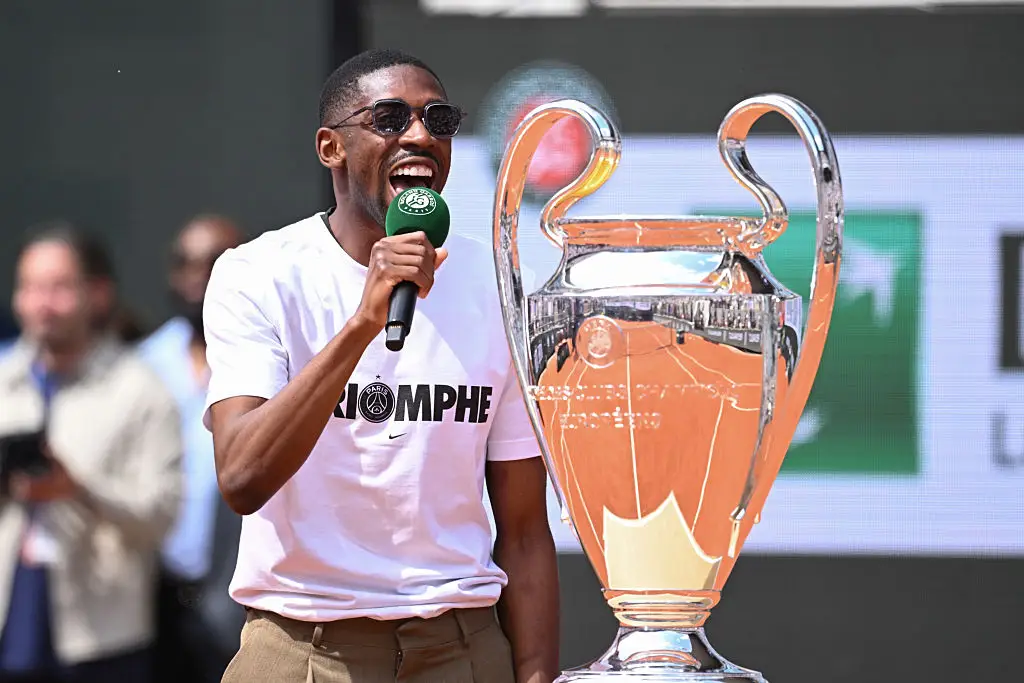Ousmane Dembele celebrates with the Champions League trophy at the French Open tennis tournament (Image: Getty)