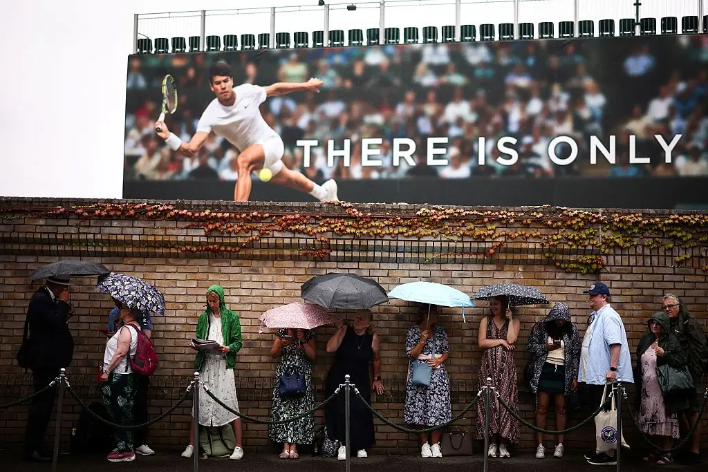 The Wimbledon ticket queues get bigger every year (Getty/HENRY NICHOLLS) 