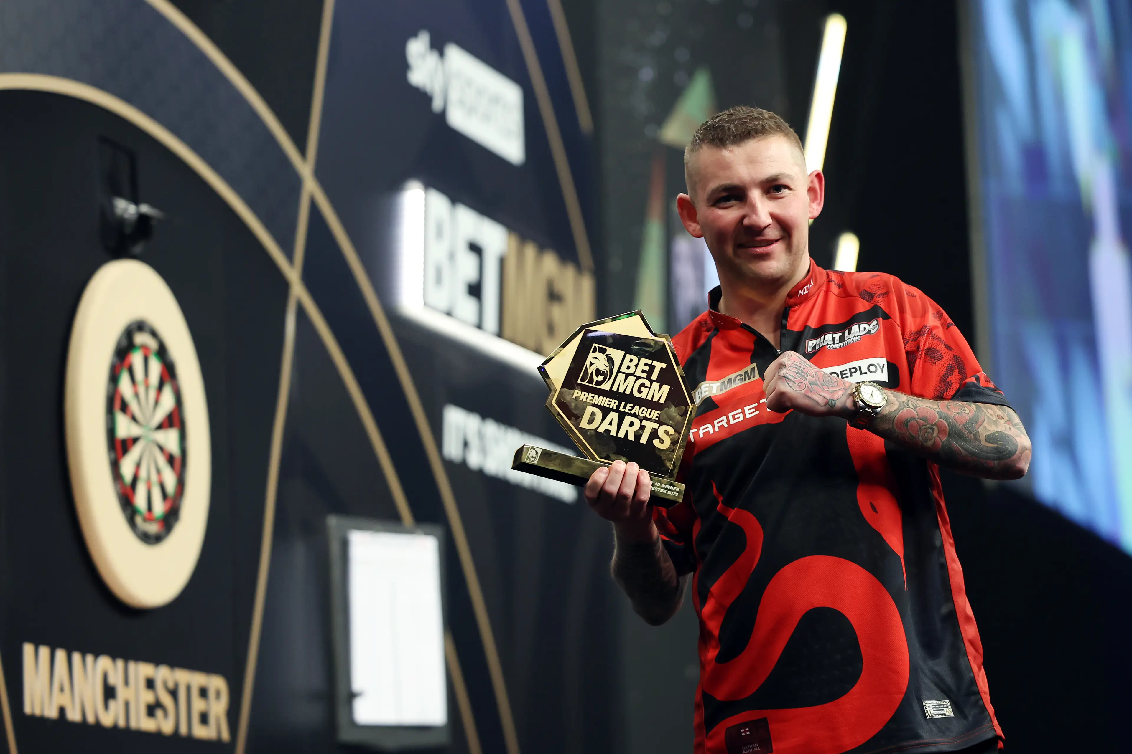 Nathan Aspinall won the Premier League darts event in Manchester. Image: Getty