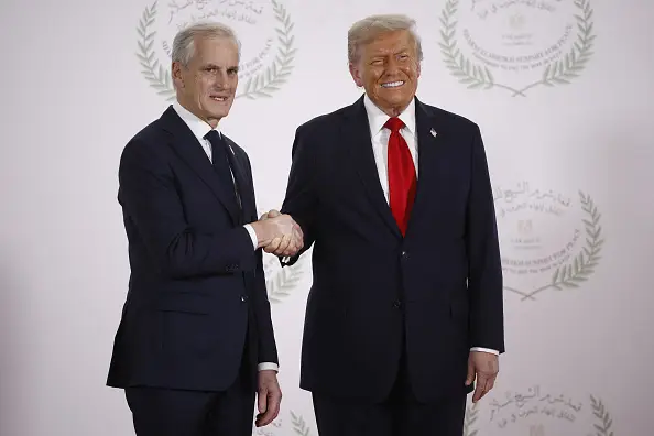 Norway PM Jonas Gahr Store pictured with US President Trump (Image: Getty)