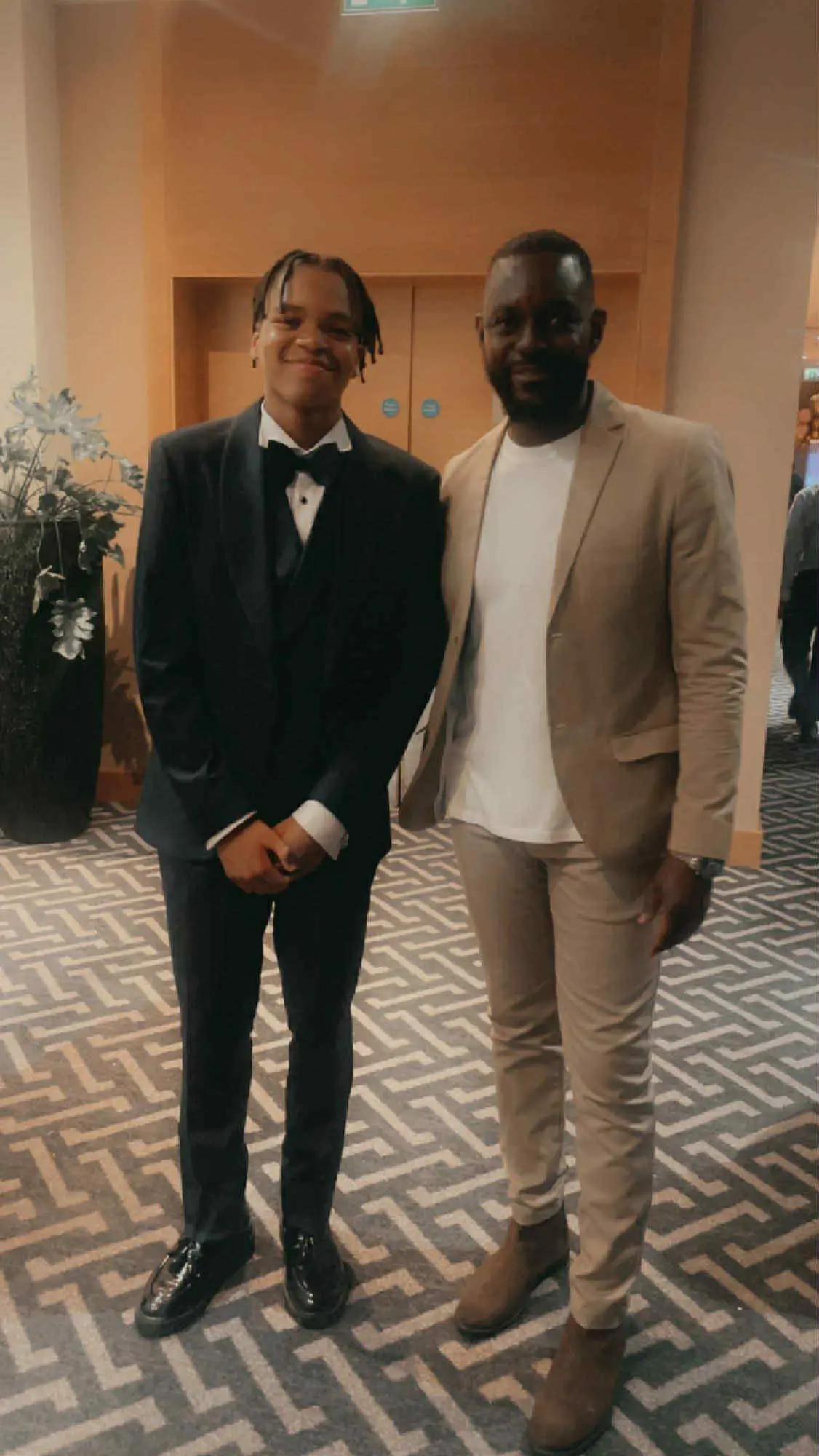 Rio Ngumoha and William Brobby at Kingsford Community School's end-of-year prom.