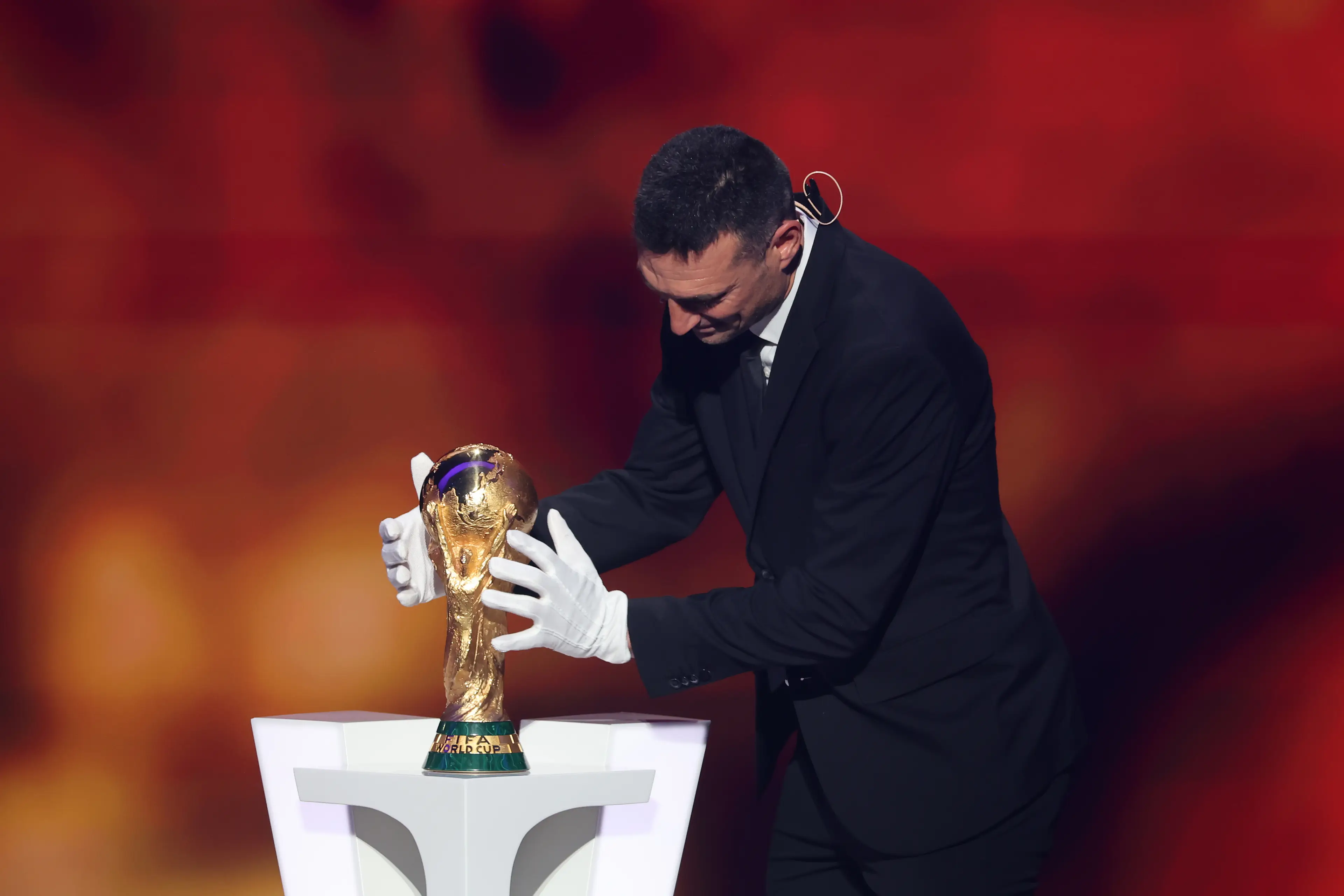 Scaloni was forced to wear gloves at the draw. Image credit: Getty