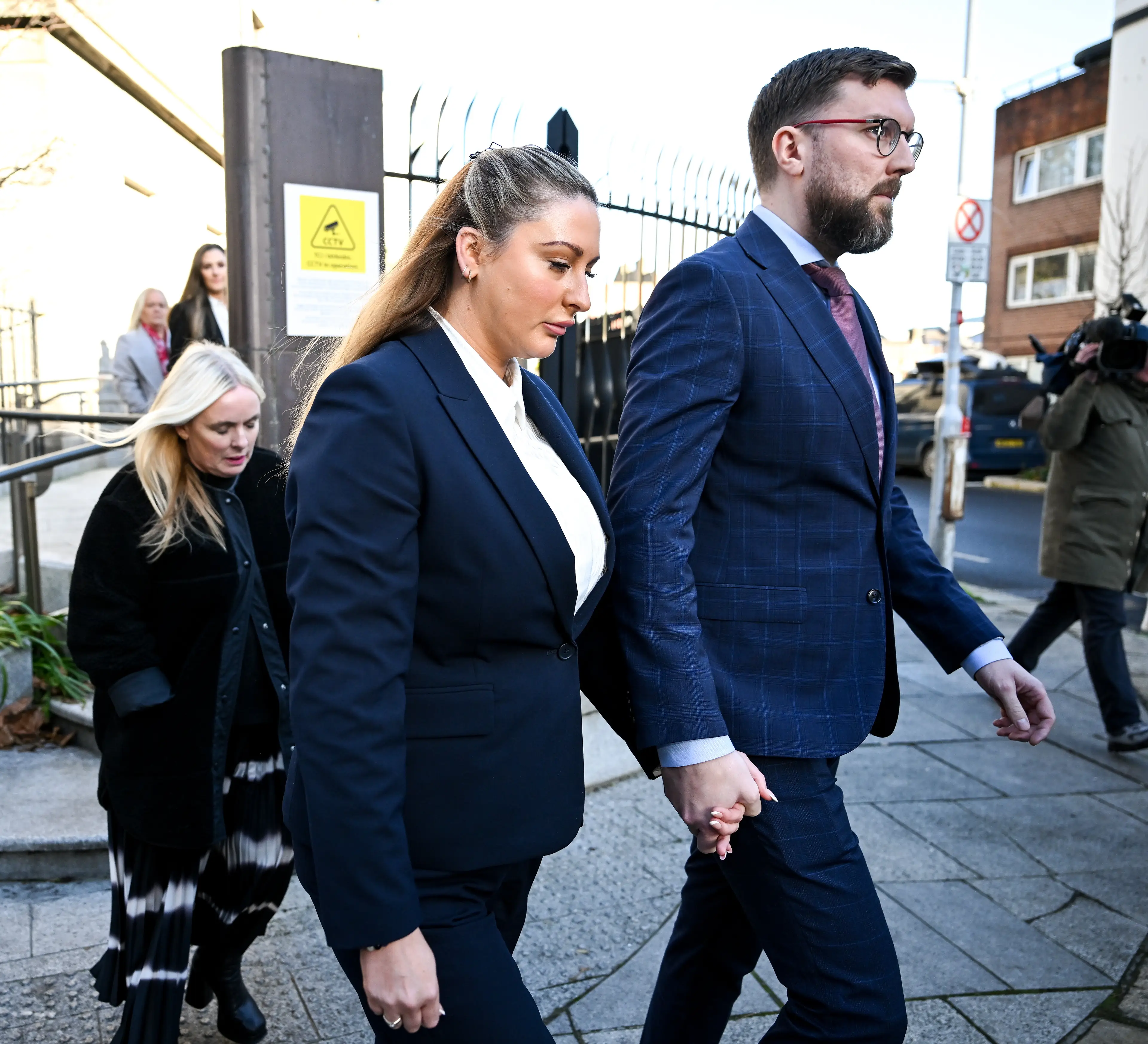 Ms Nikita Ni Laimhin, who is also known as Ms Nikita Hand, arrives for the civil action case. Image credit: Getty