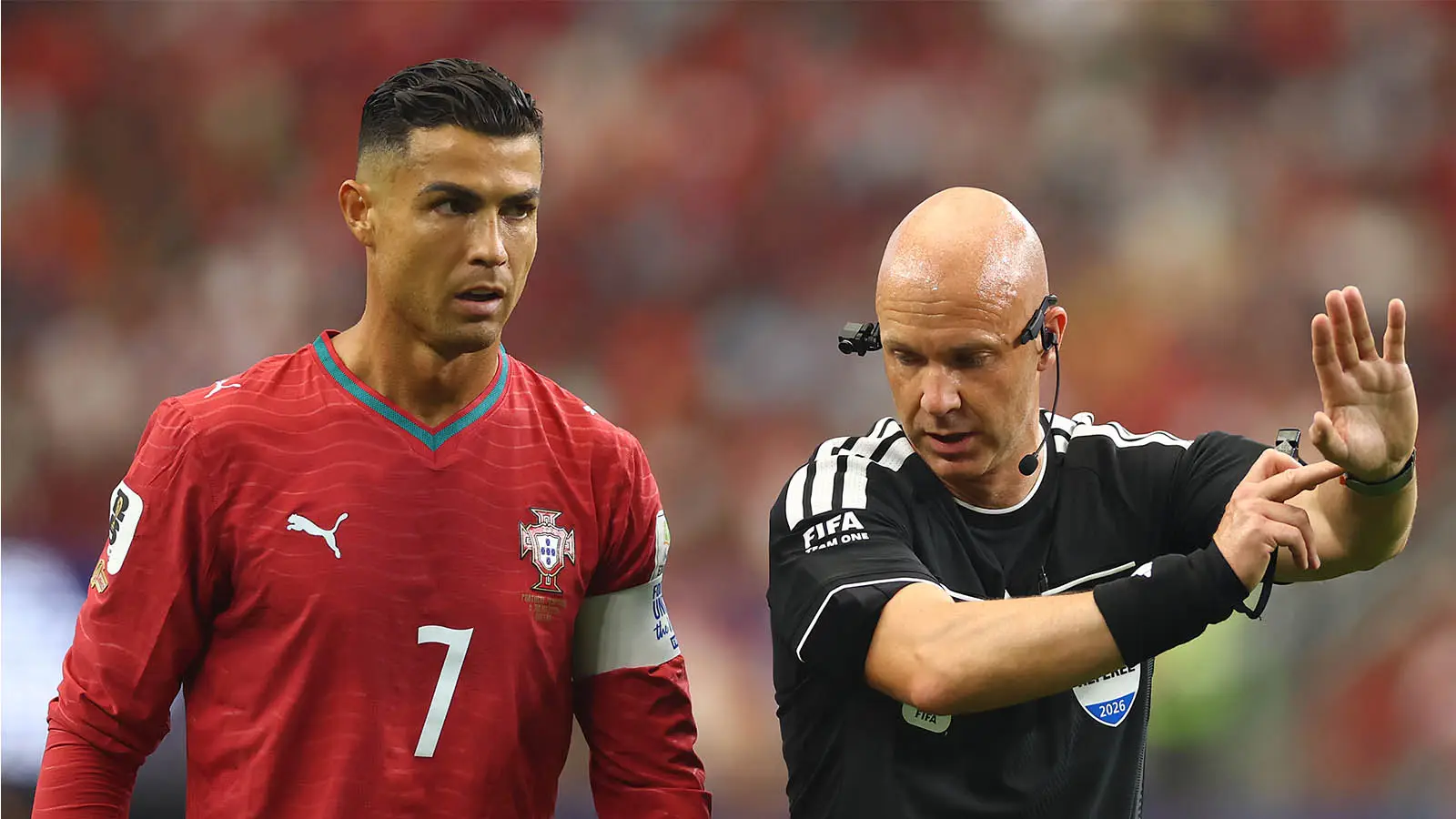 Anthony Taylor in conversation with Cristiano Ronaldo during Portugal's 1-0 defeat to Spain at the World Cup (Image: Getty)
