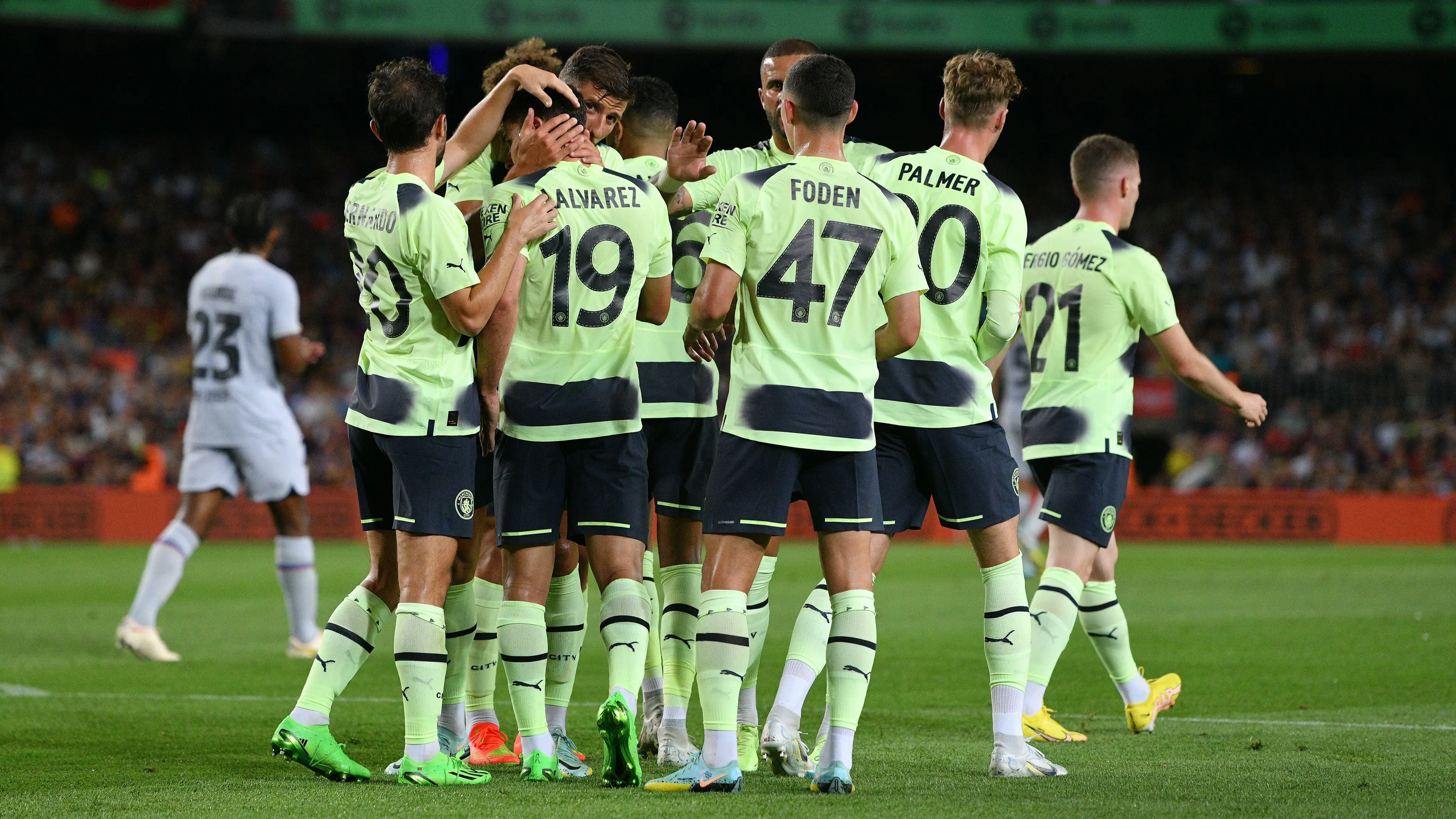 Manchester City celebrate against Barcelona in a charity friendly.