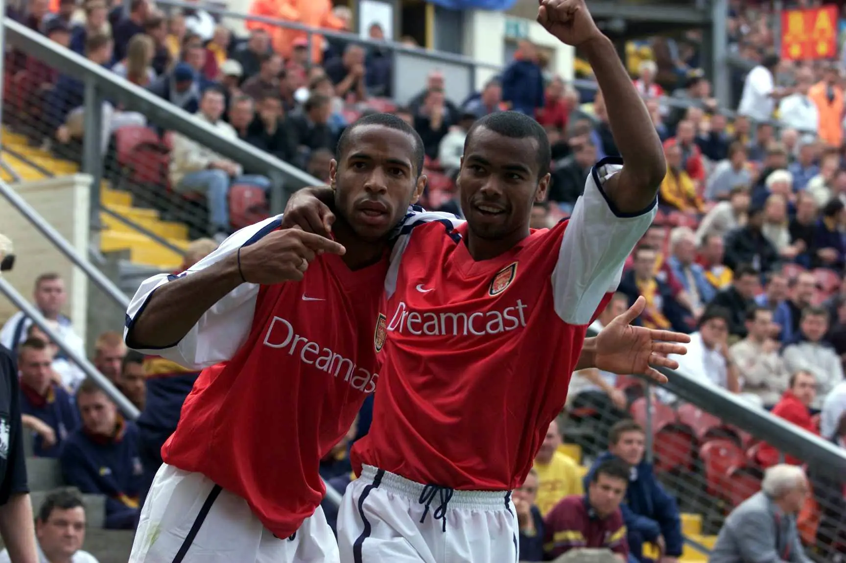 Thierry Henry and Ashley Cole celebrate an Arsenal goal. Image: Getty