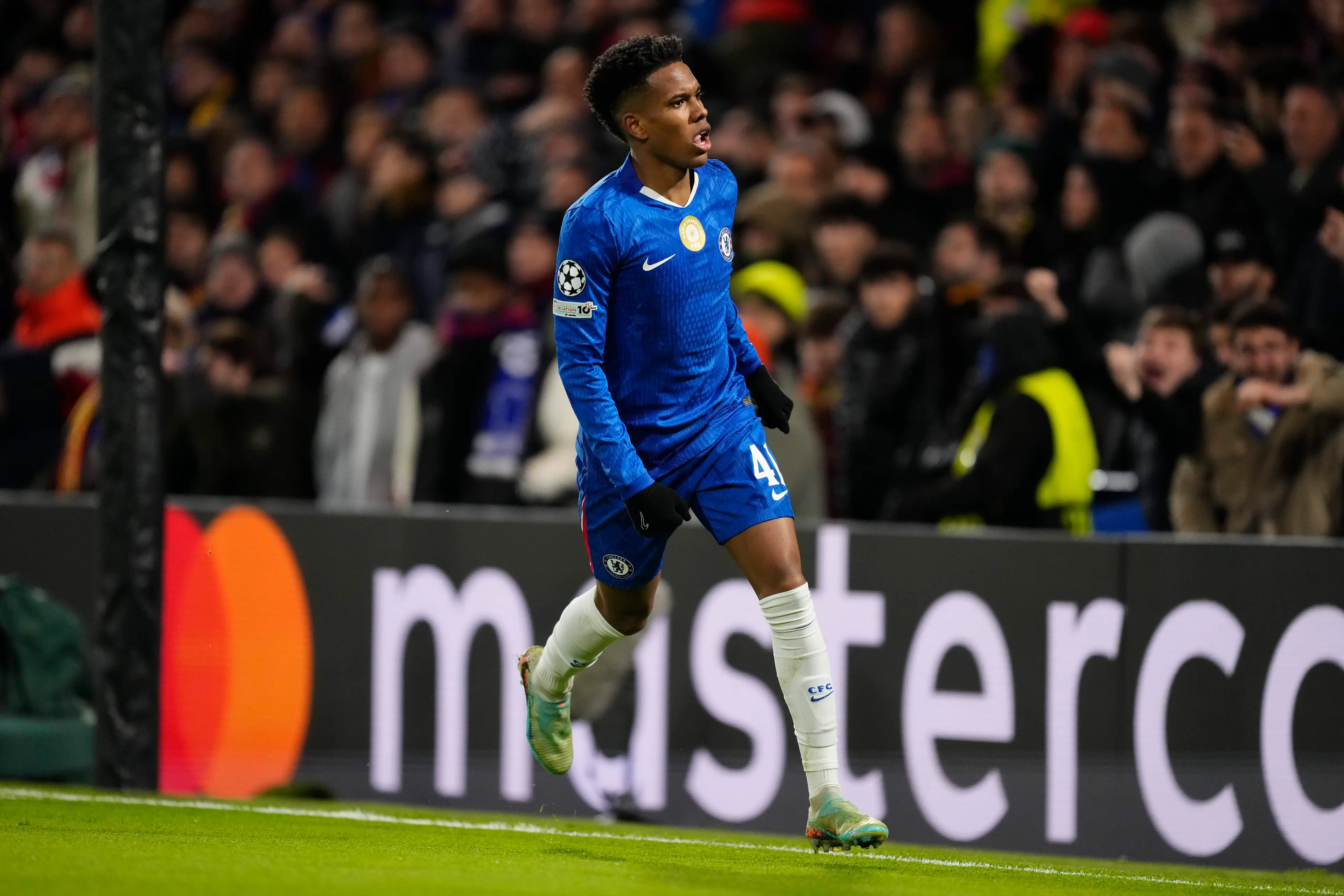 Estevao wheels away in celebration after scoring against Barcelona. Image: Getty 