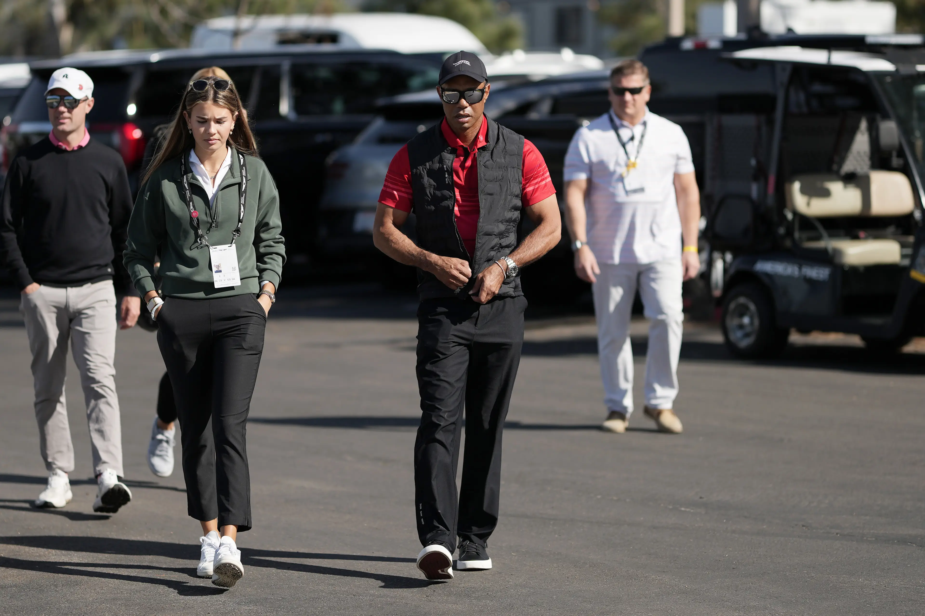Tiger Woods arrives with Kai Trump at The Genesis Invitational 2025 in February. Image: Getty