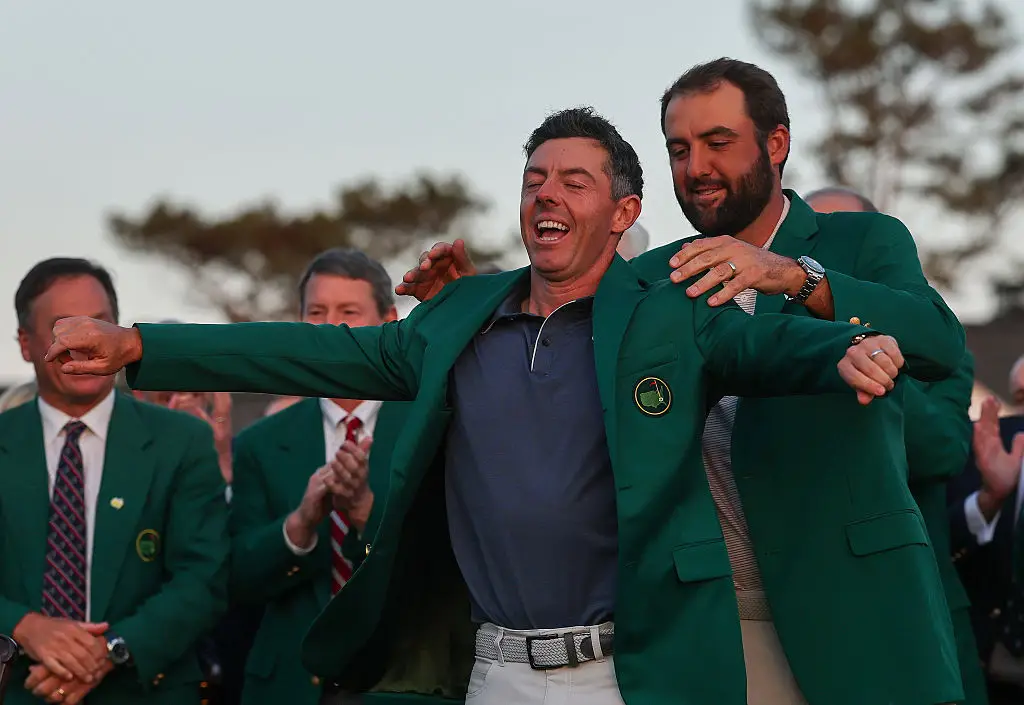 Scottie Scheffler presented Rory McIlroy with his green jacket at the Masters (Credit:Getty)