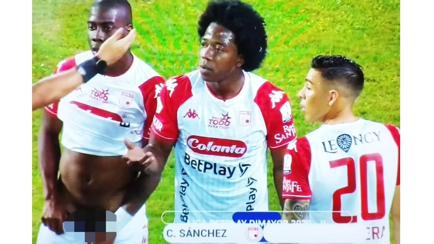 Fans stunned after footballer pulls down his shorts and exposes his manhood while defending a free-kick