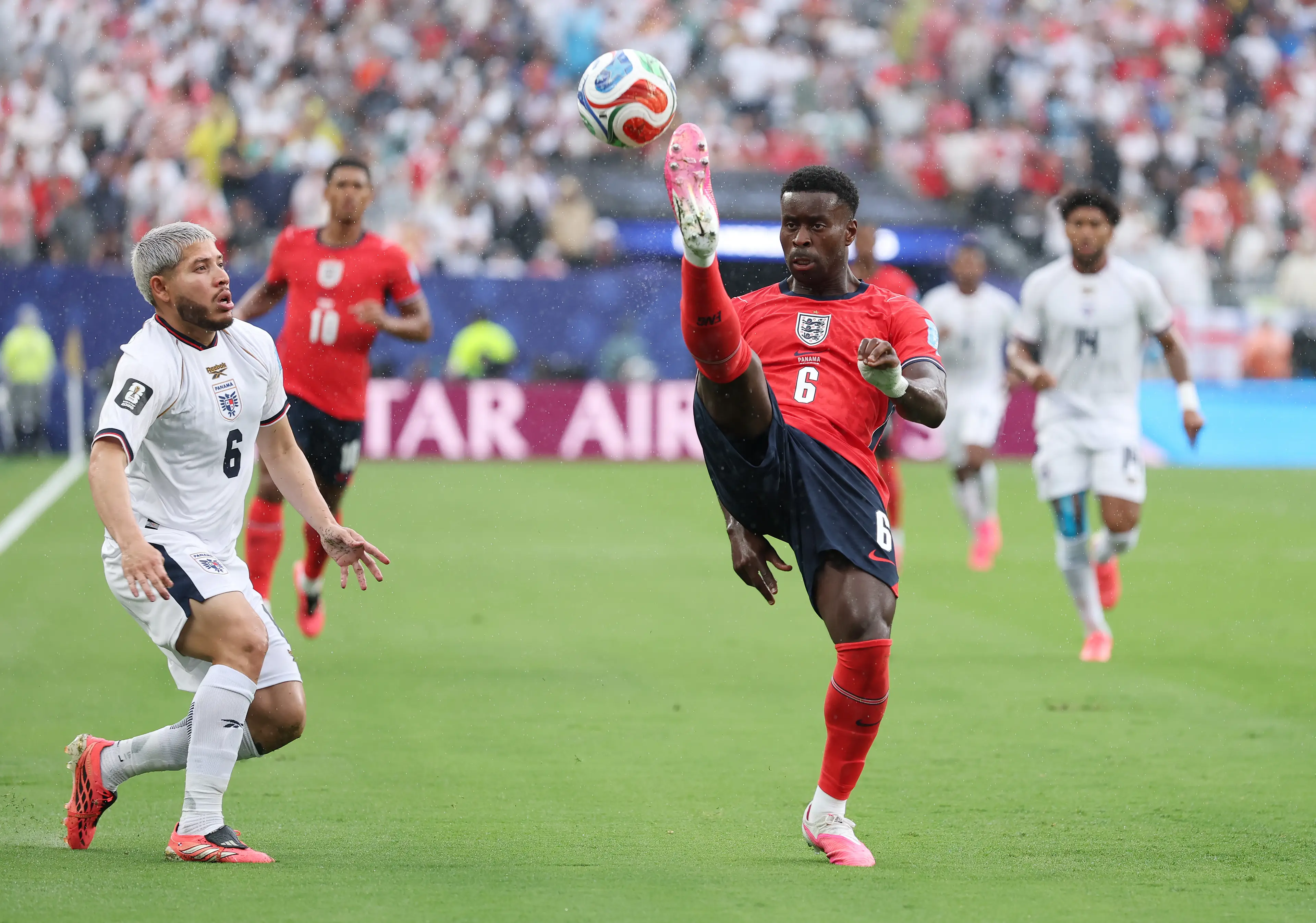  Marc Guehi #6 of England controls the ball under pressure from Cristian Martinez #6 of Panama during the FIFA World Cup 2026