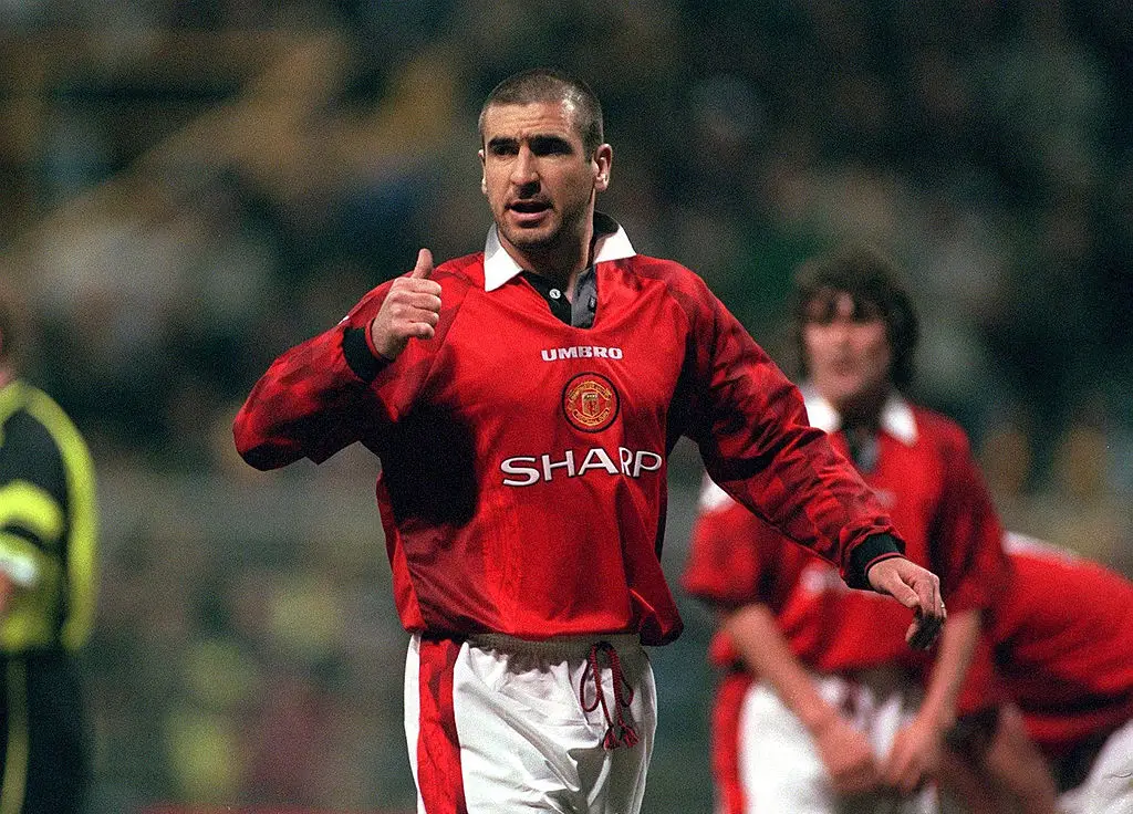 Eric Cantona in action for Manchester United (Credit:Getty)