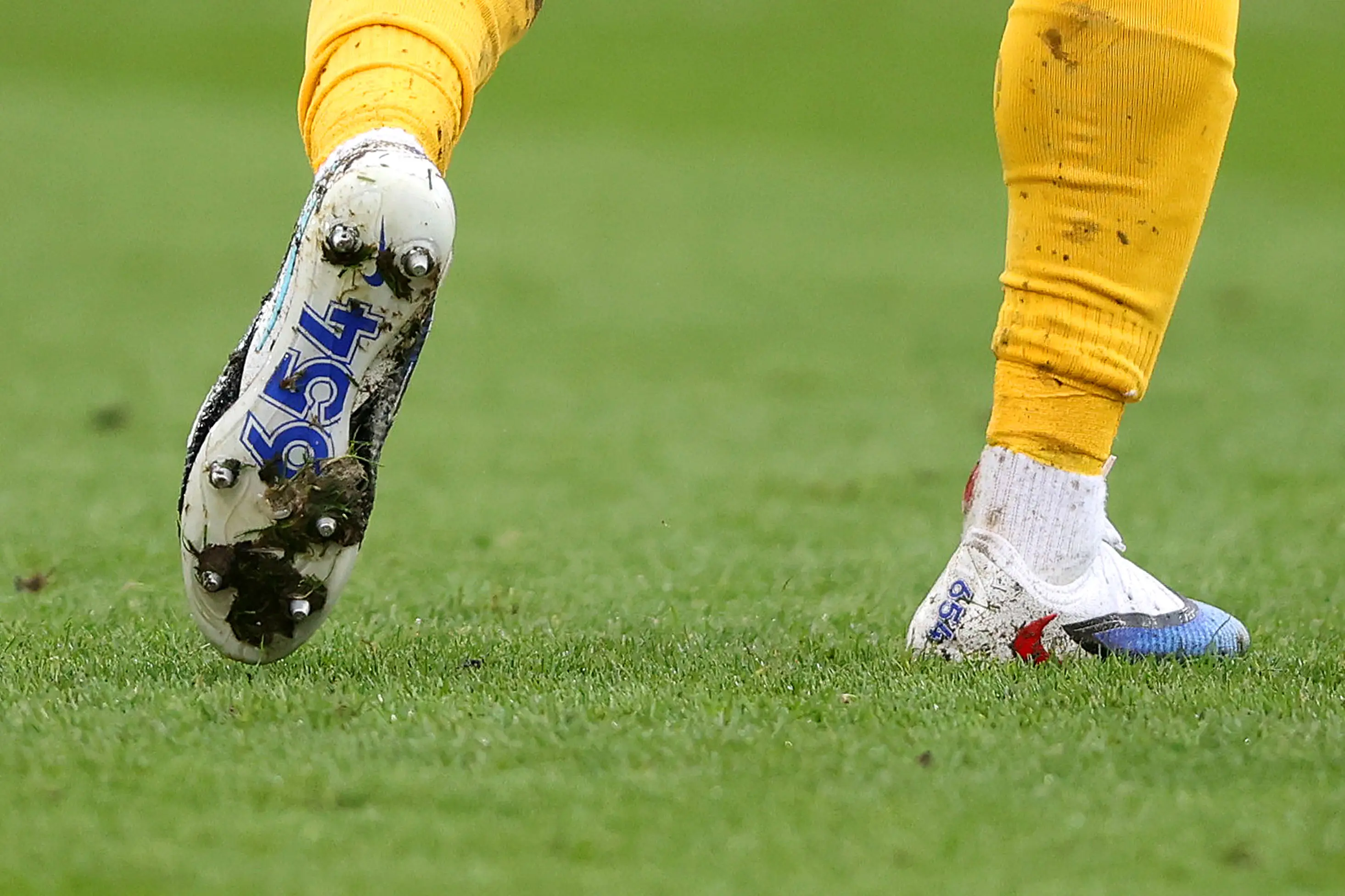 Milner wore the number 654 on his boots to mark the record-breaking 654th Premier League appearance. Image credit: Getty