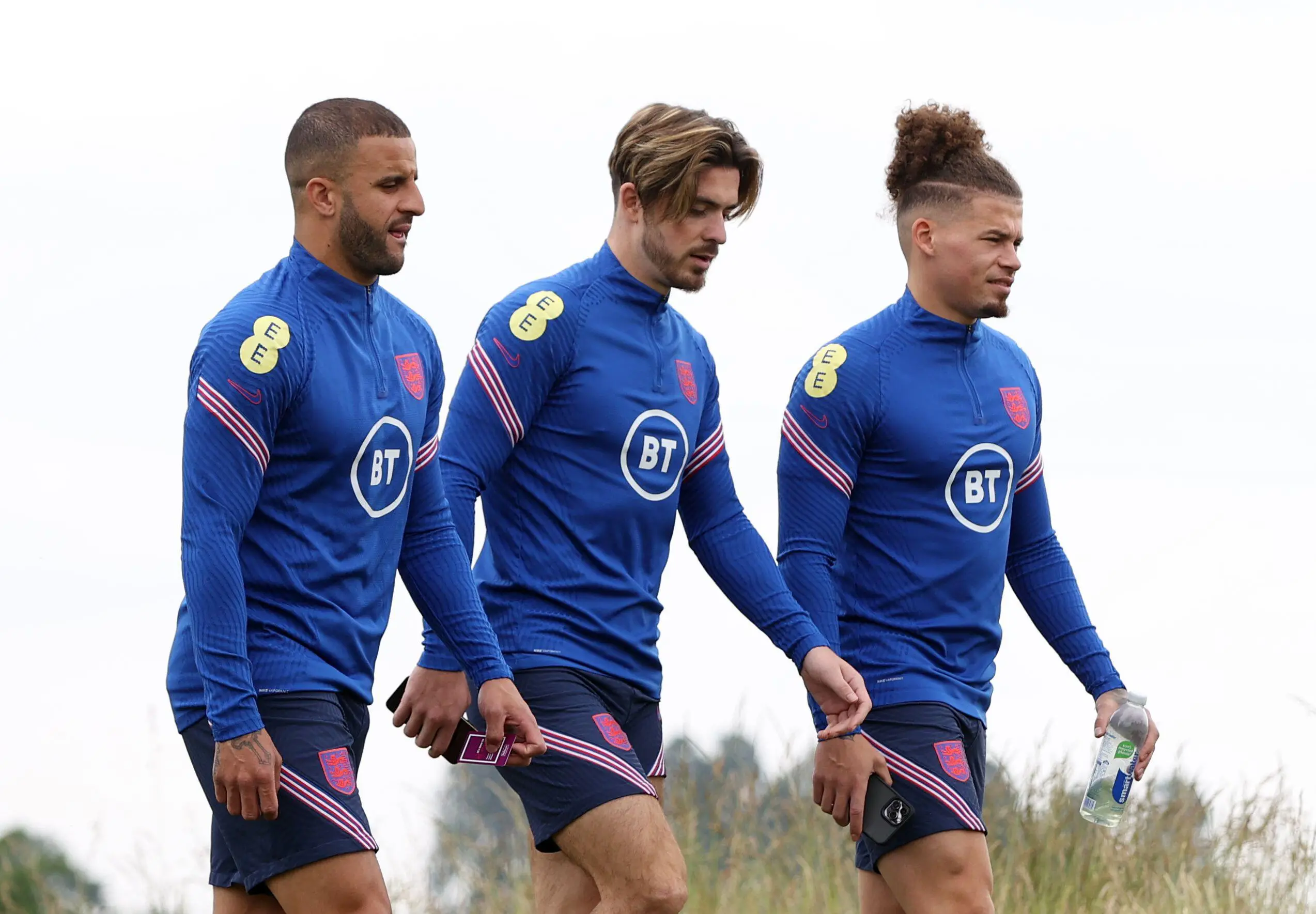 Walker and Phillips with City teammate Jack Grealish. (Image