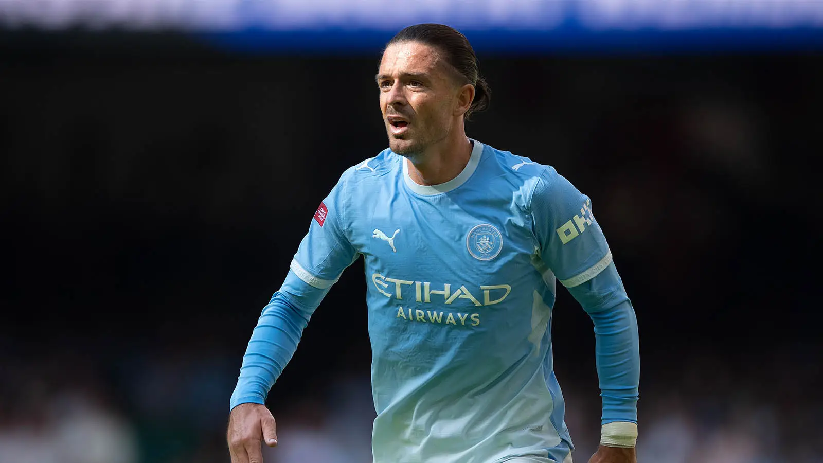 Jack Grealish has twice appeared as a substitute for Manchester City this season (Image: Getty)