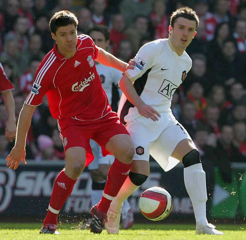 Xabi Alonso in action against Michael Carrick (Credit:Getty)