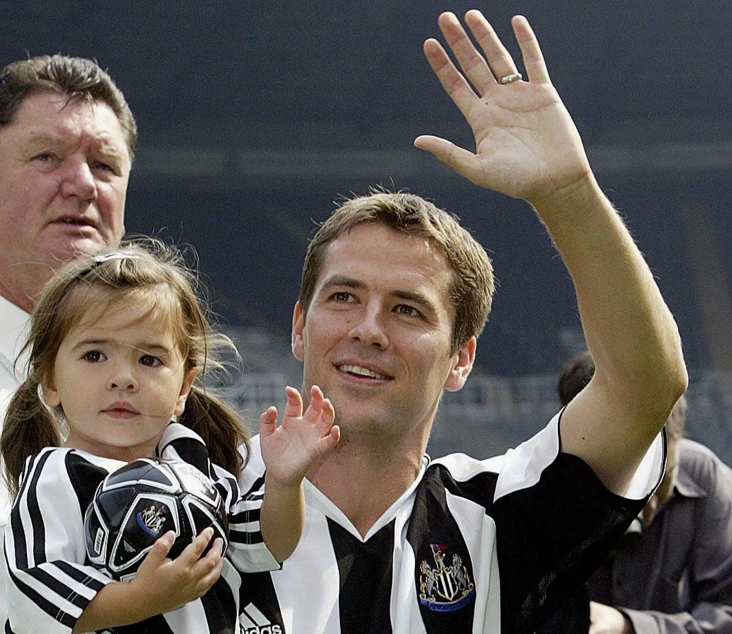 Michael Owen holding two-year-old Gemma back in 2005, whilst being introduced to Newcastle United fans. Image: Alamy